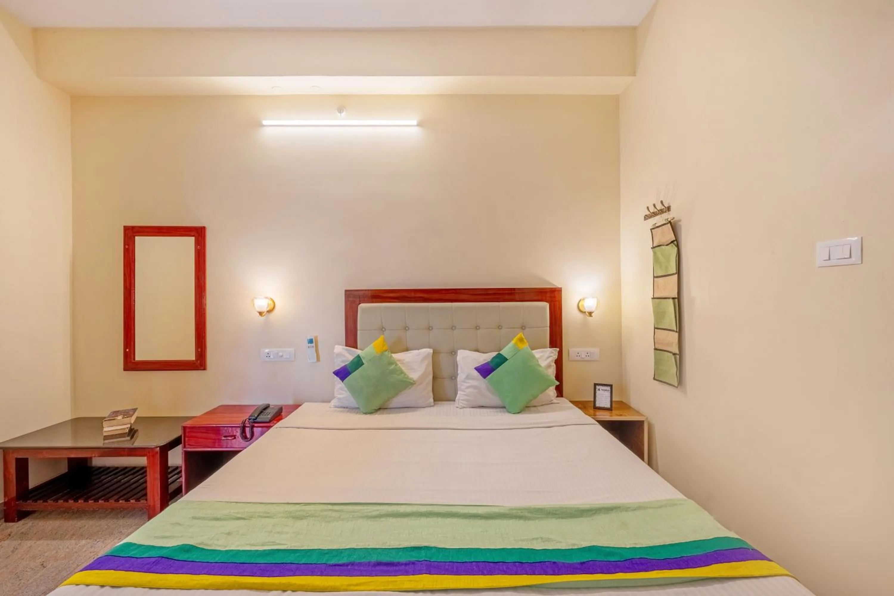 Bedroom, Bed in Treebo Grace Inn, 3 Min Walk From Promenade Beach