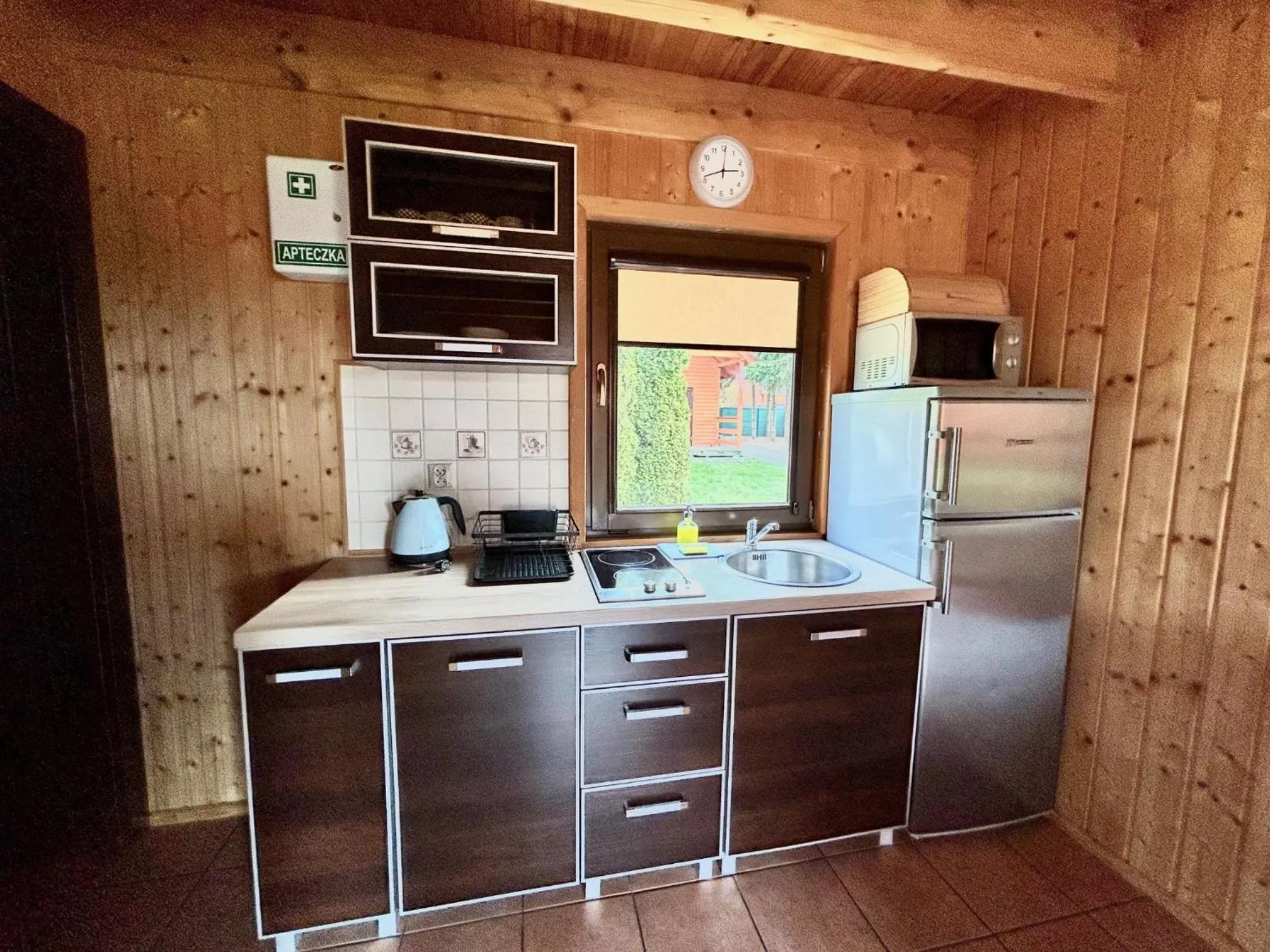 Kitchen or kitchenette in Domki Wczasowe Papaya