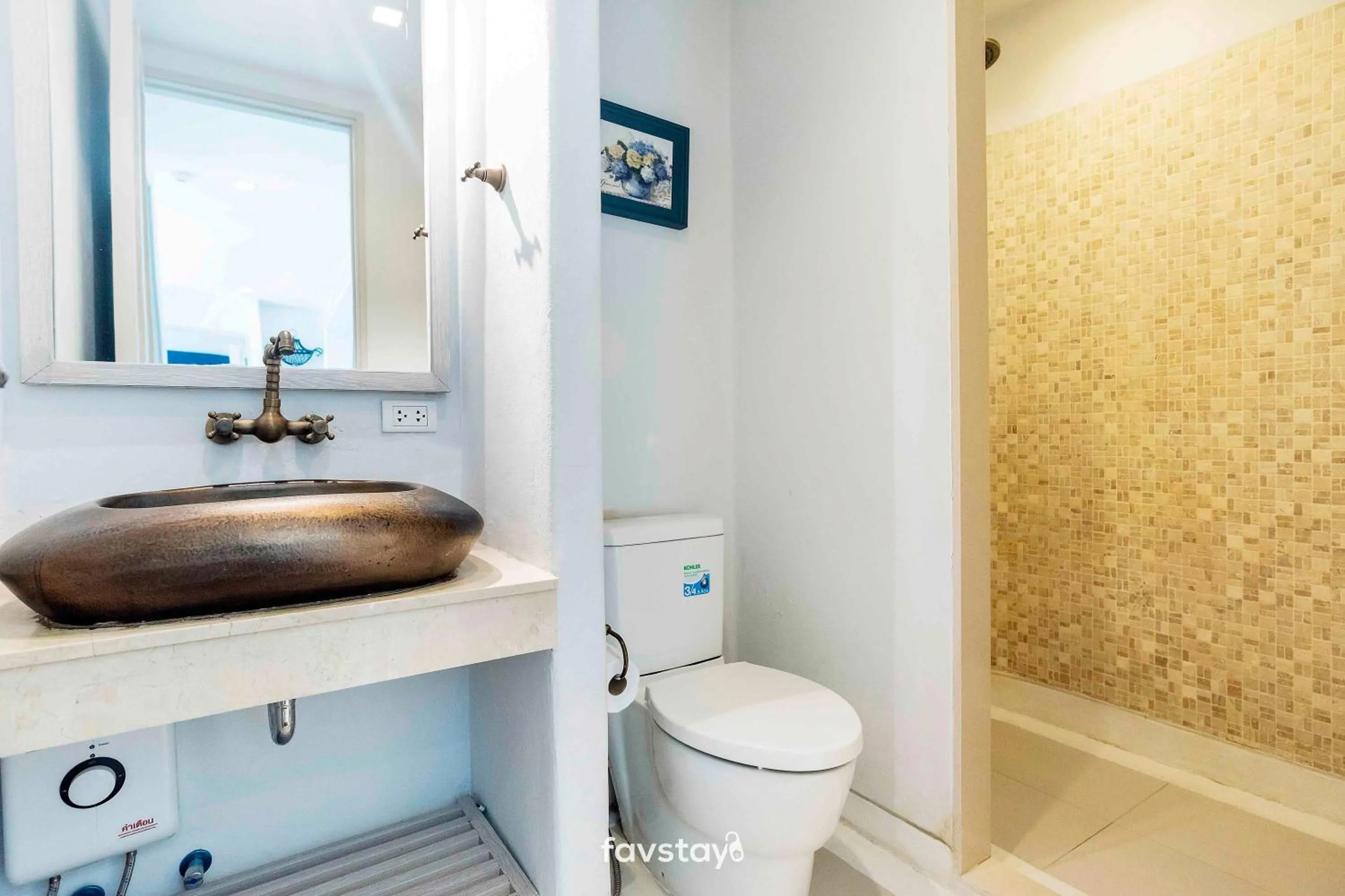 Bathroom in Chelona Hua Hin by Favstay