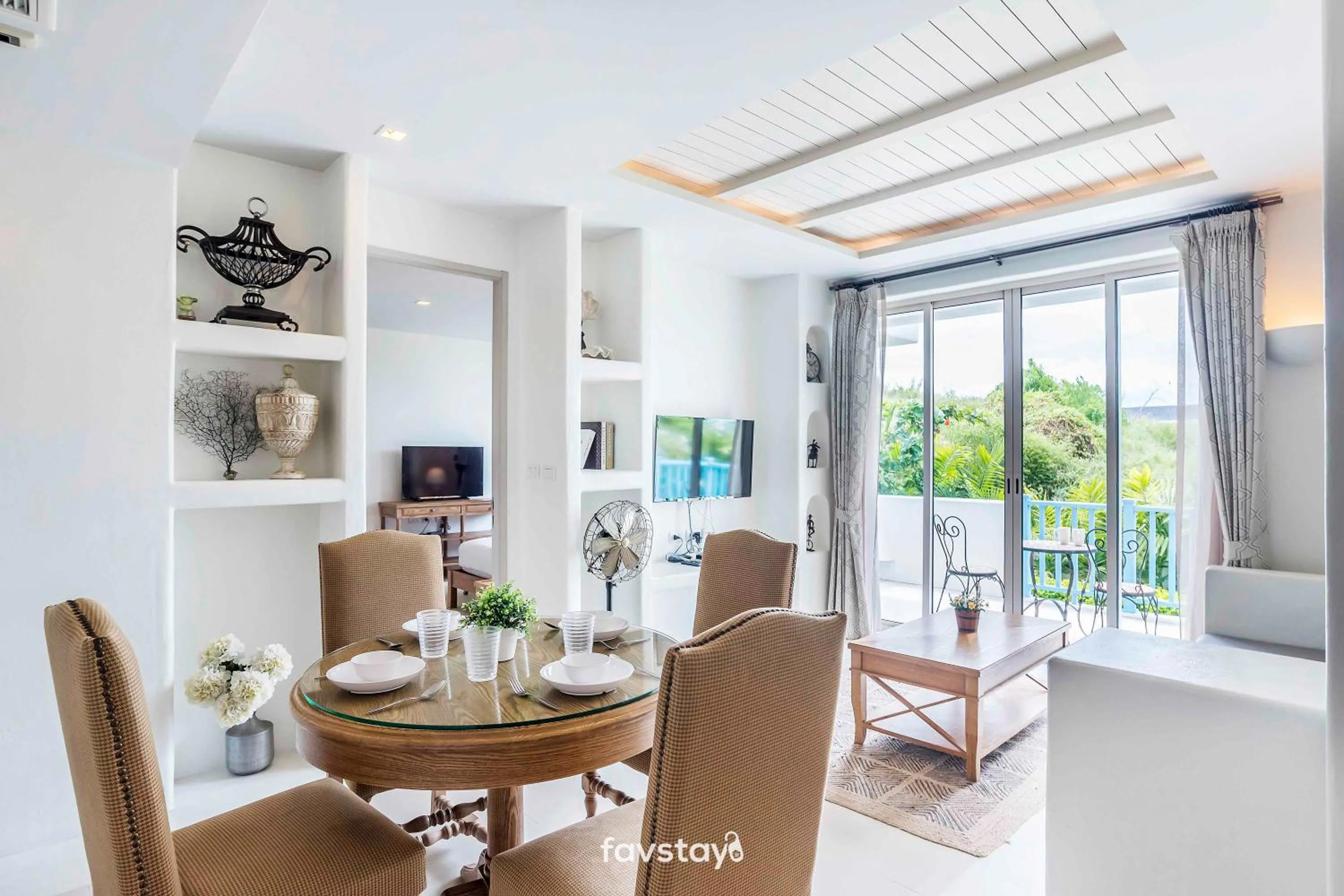 Living room in Chelona Hua Hin by Favstay