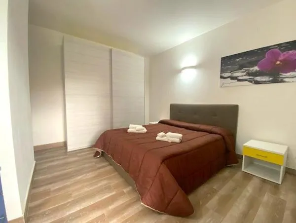 Photo of the whole room, Bed in La Coccinella al mare