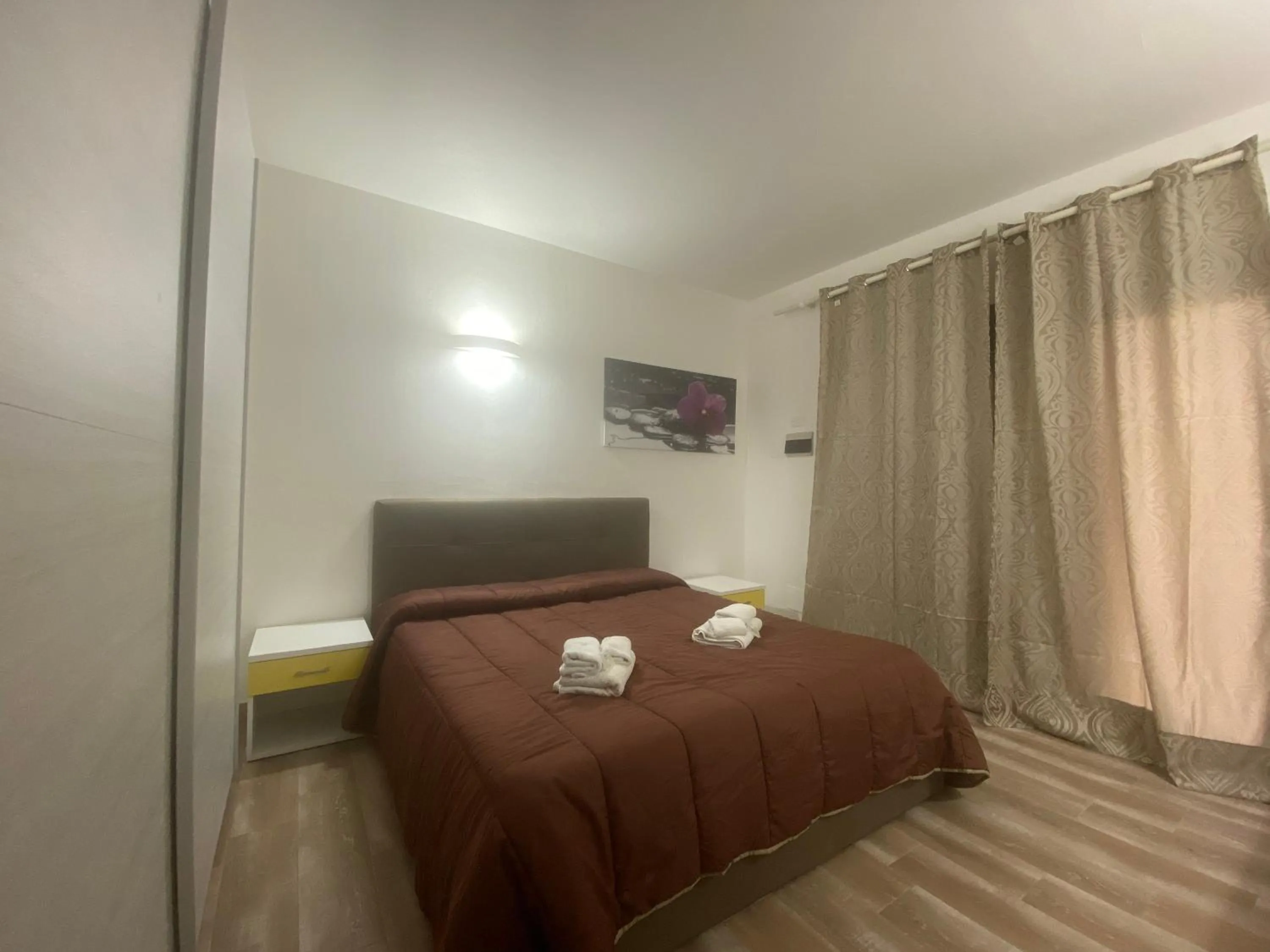 Photo of the whole room, Bed in La Coccinella al mare