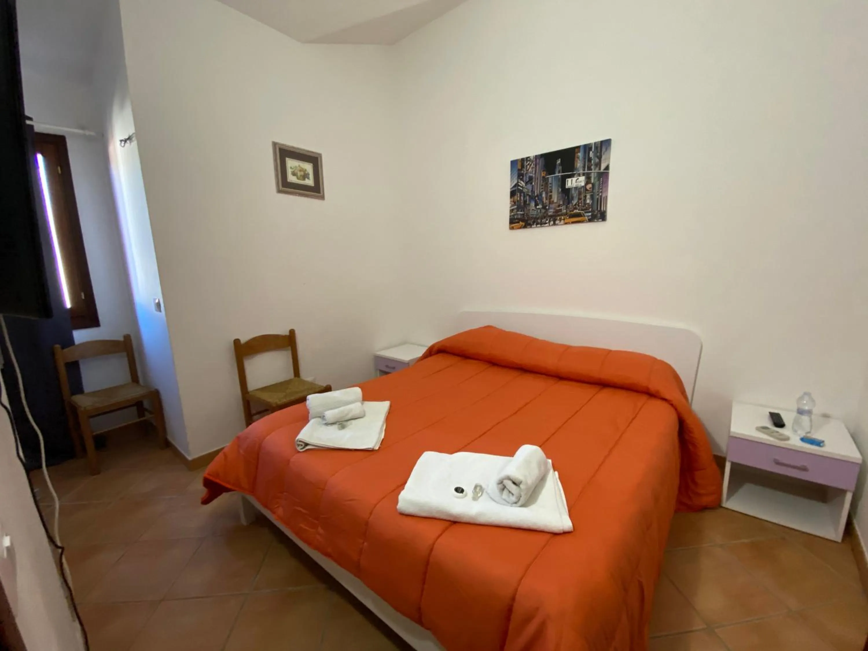 Photo of the whole room, Bed in La Coccinella al mare