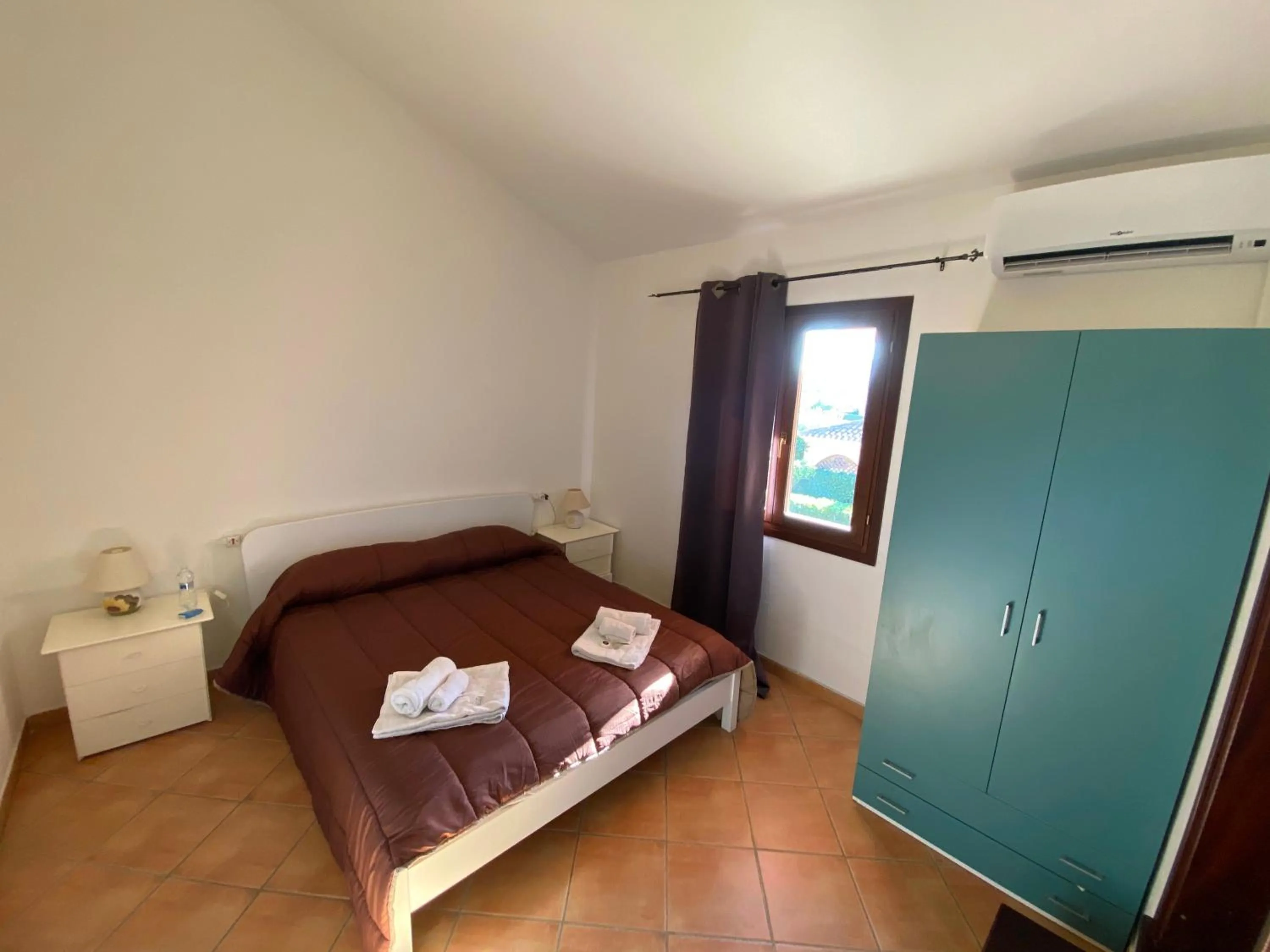 Photo of the whole room, Bed in La Coccinella al mare