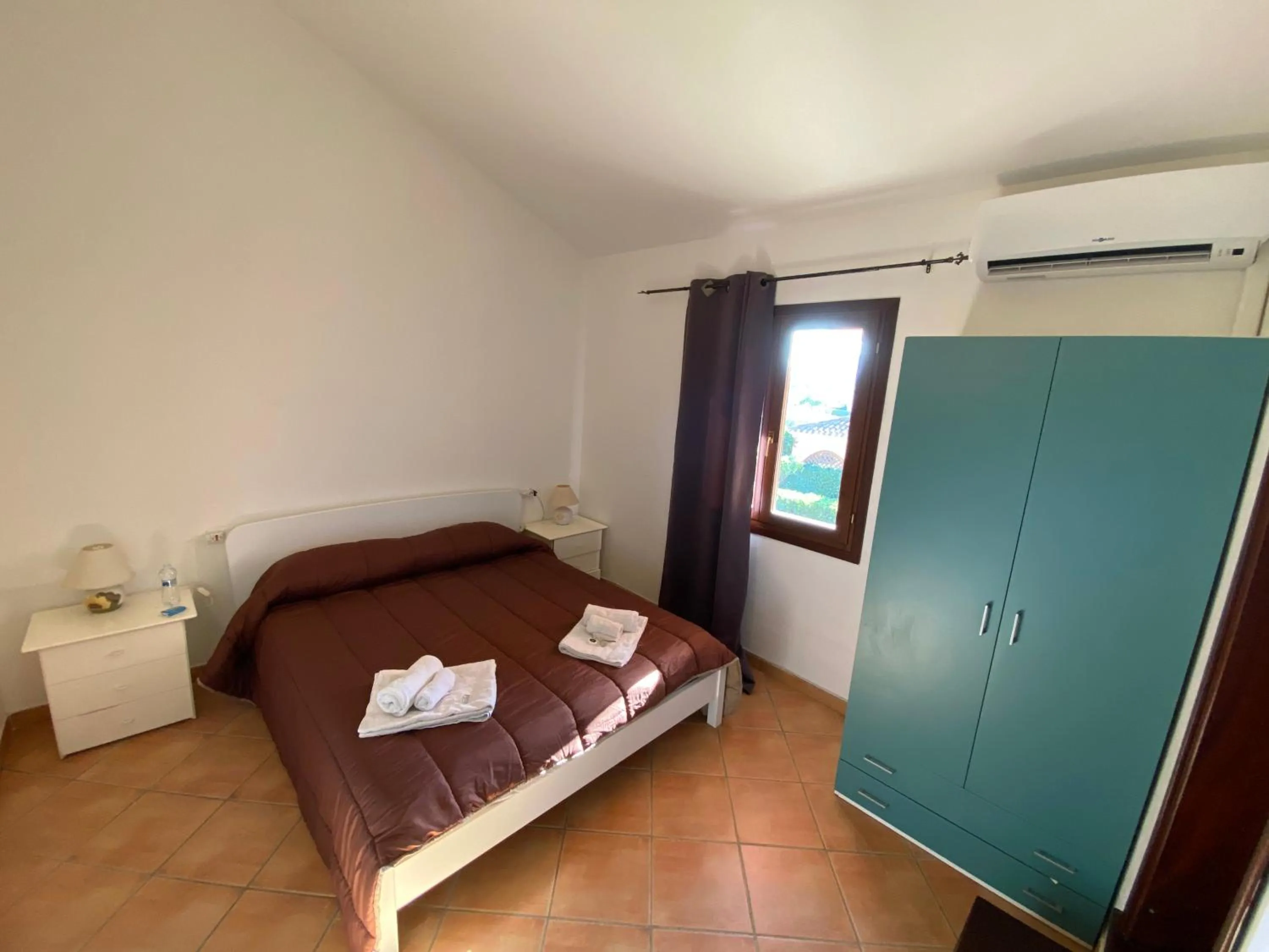 Photo of the whole room, Bed in La Coccinella al mare