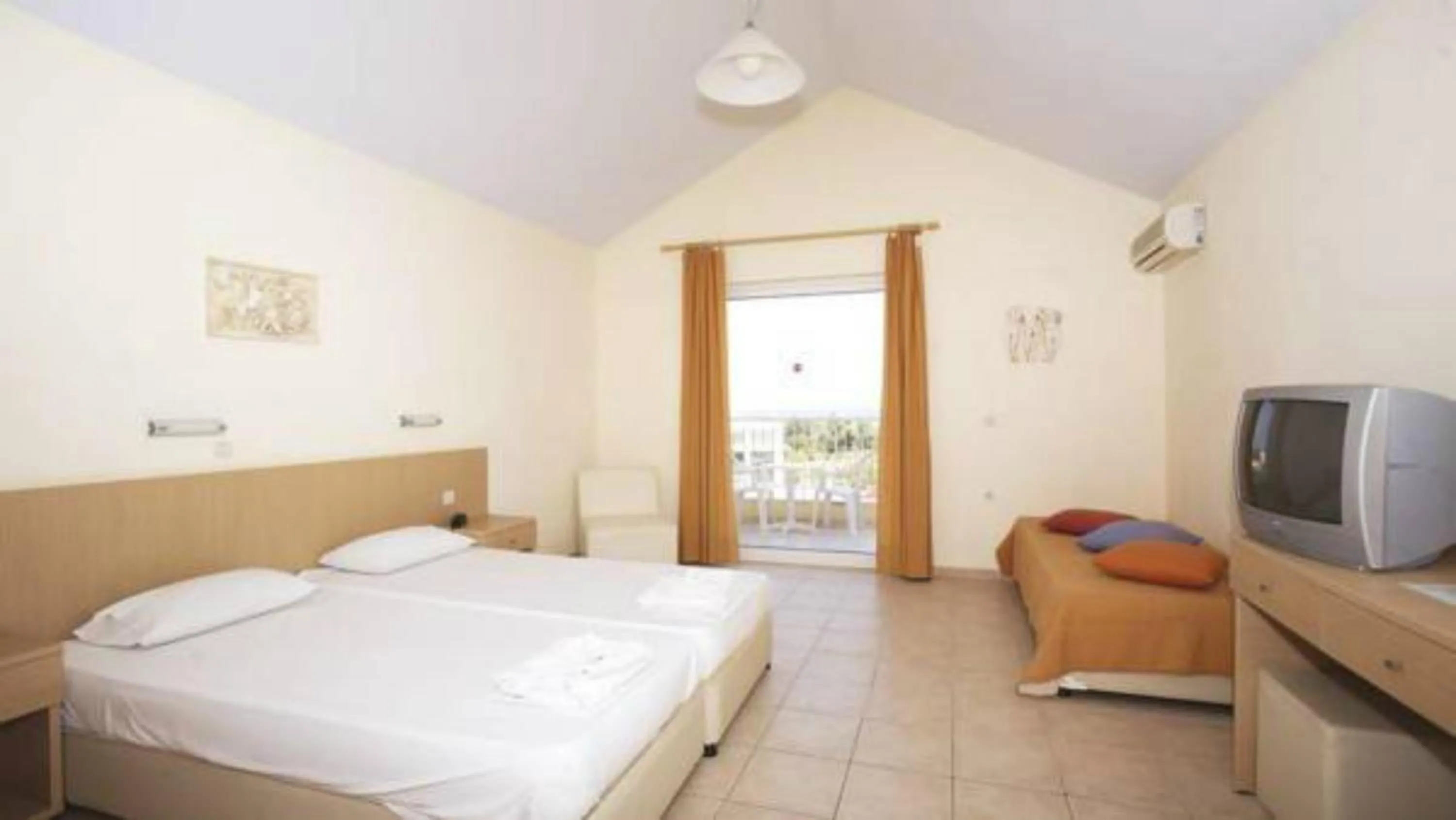 Photo of the whole room, Bed in Olympion Village