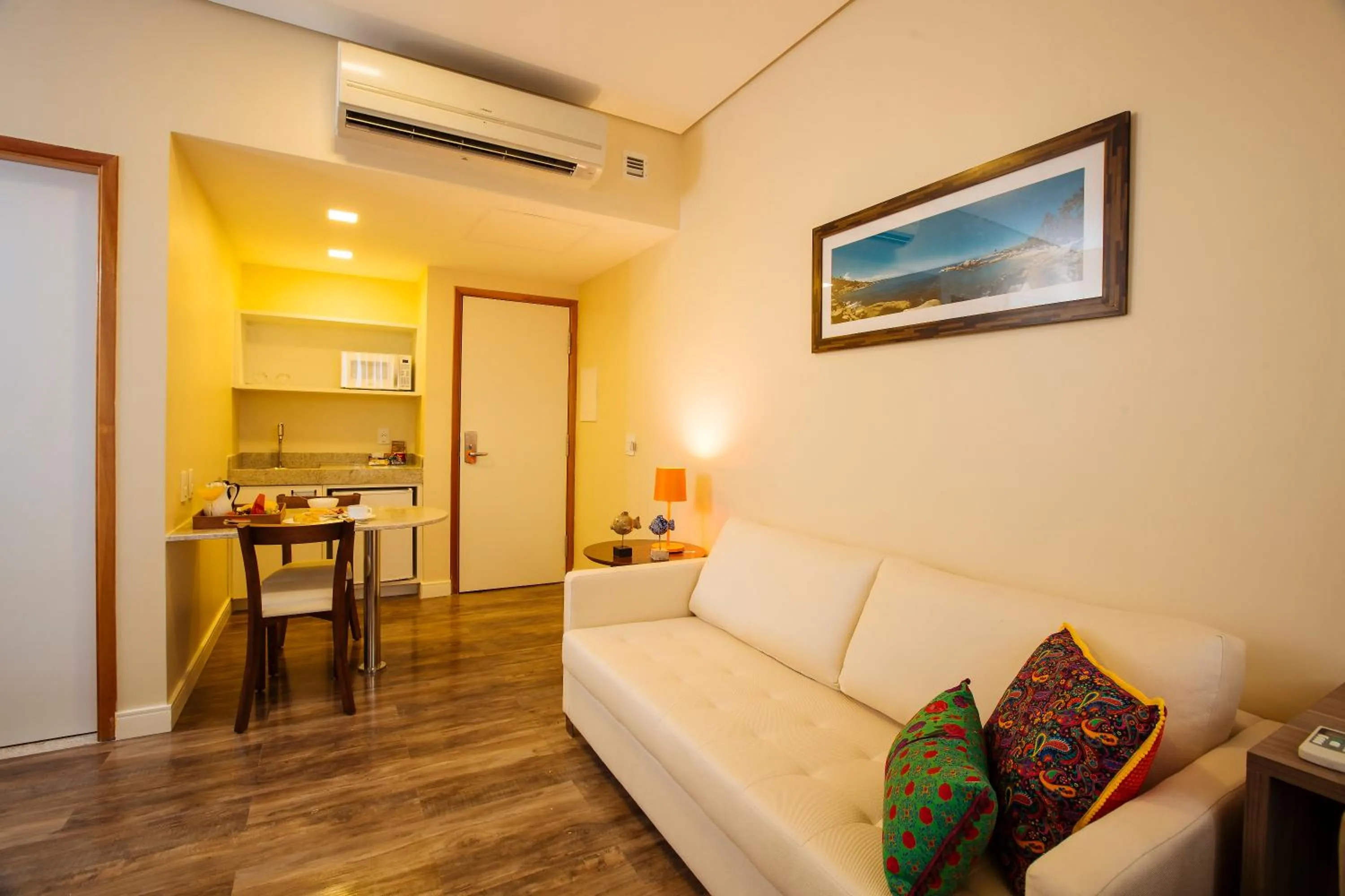 Communal lounge/ TV room in Intercity Suape Costa Dourada