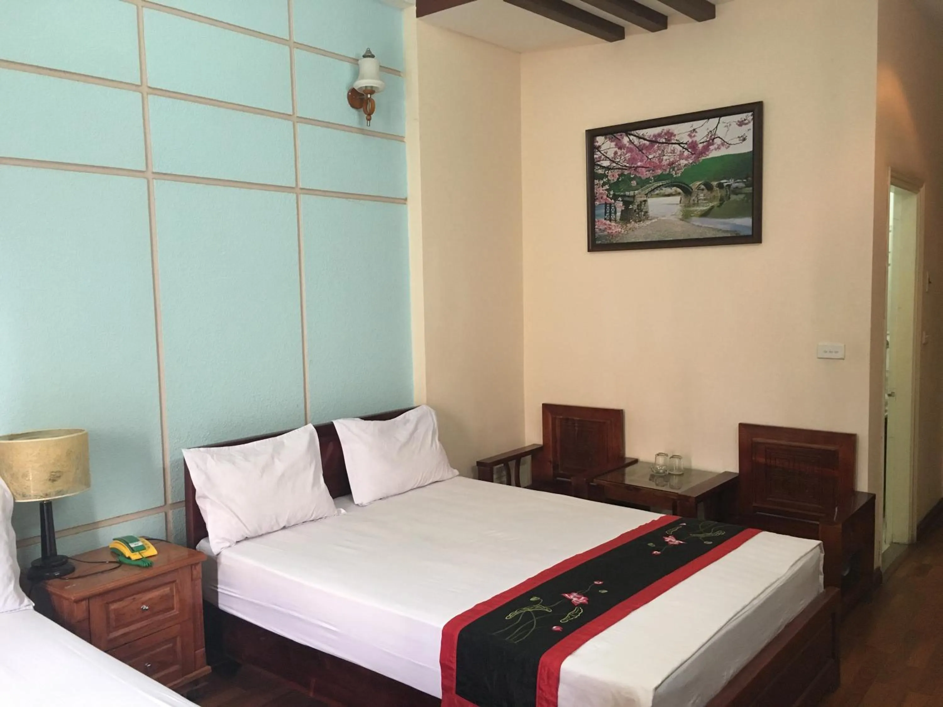 Bed in Sunrise Hotel