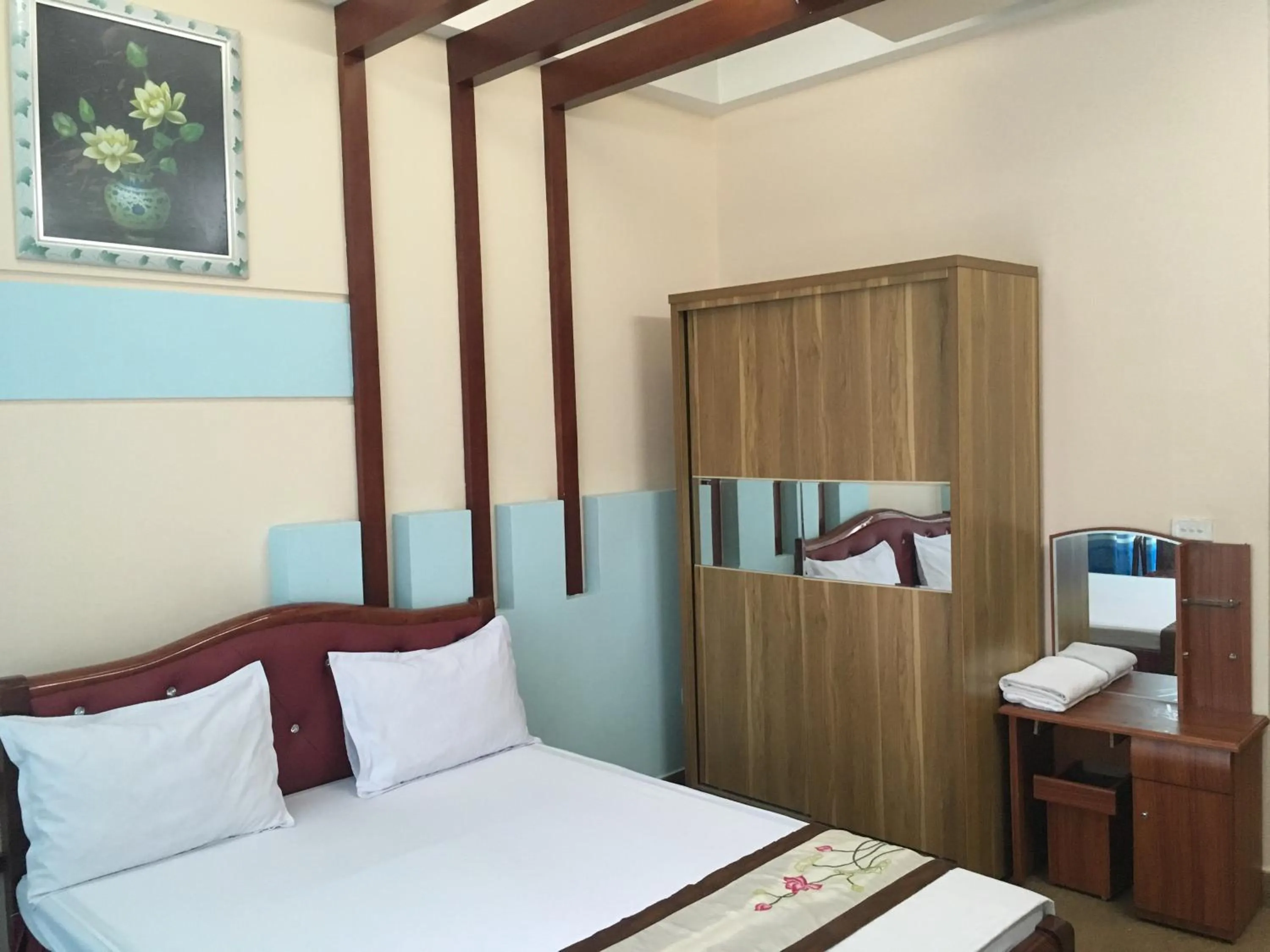 Bed in Sunrise Hotel