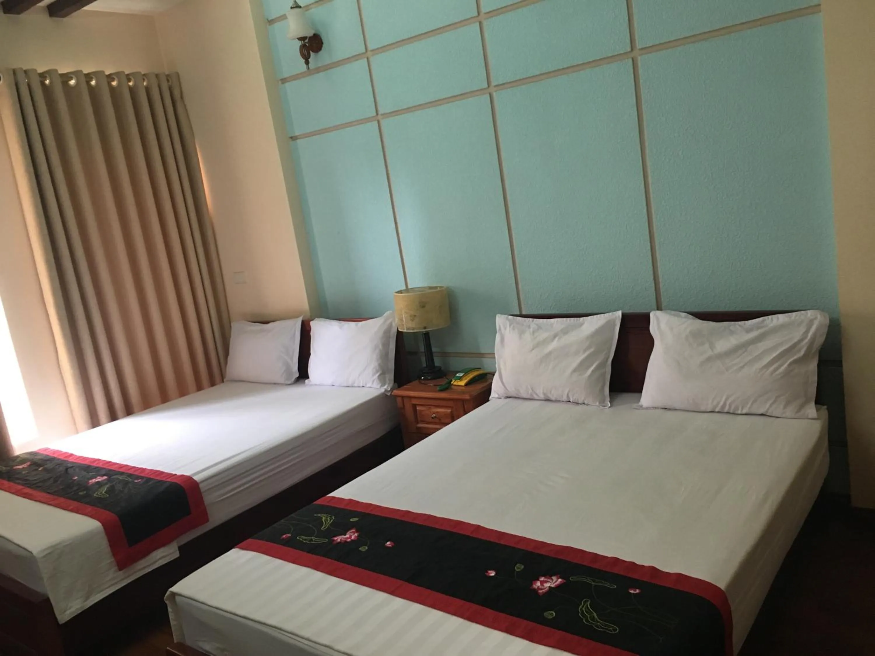 Bed in Sunrise Hotel