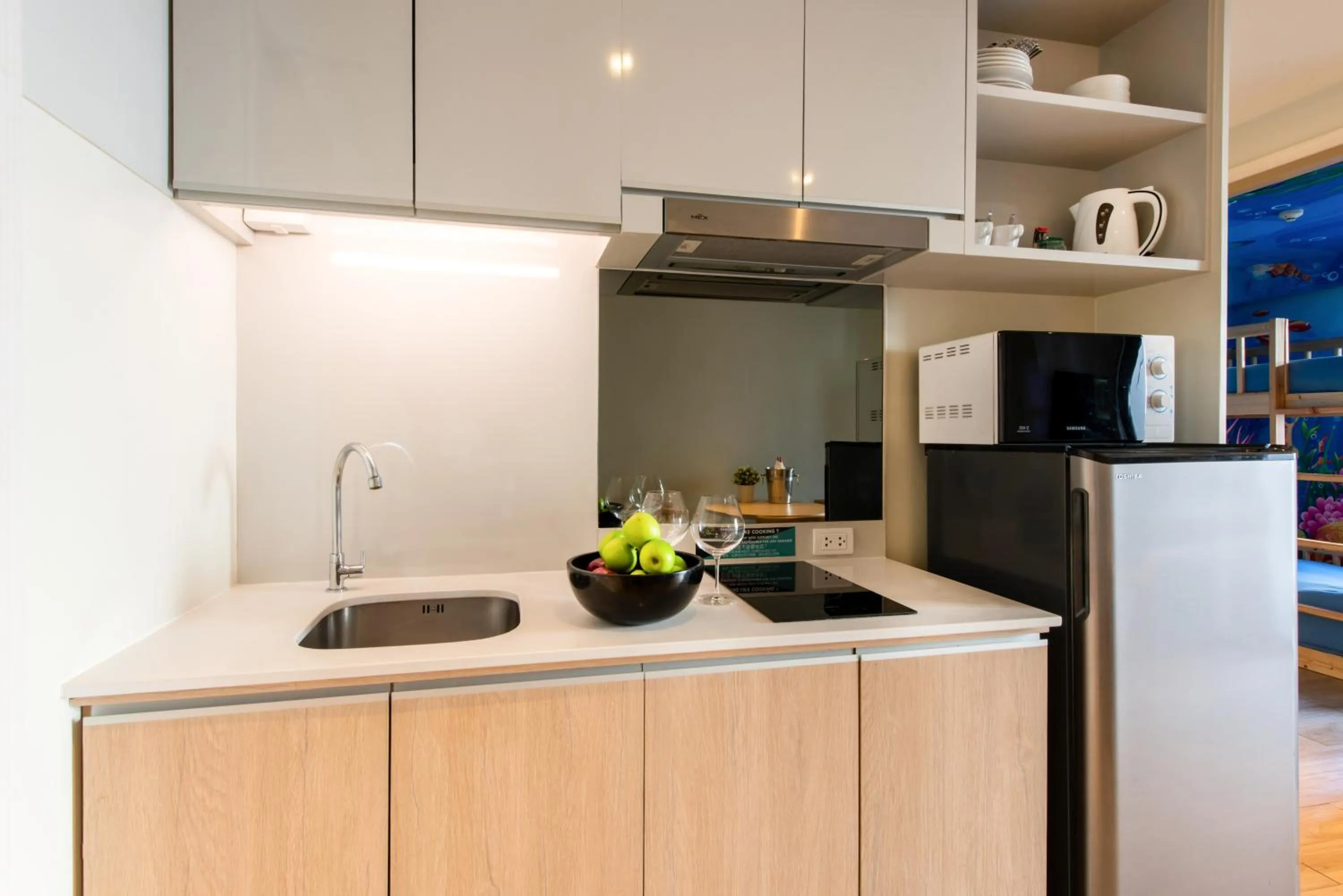 Kitchen or kitchenette in Cross Vibe Bangkok Sukhumvit