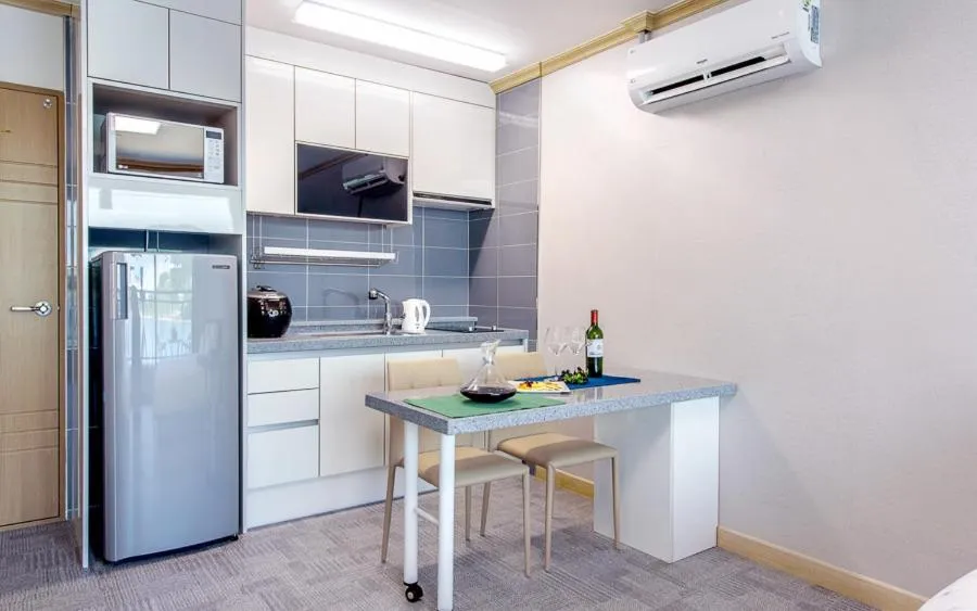 Kitchen or kitchenette in Onda D'oro Hostel