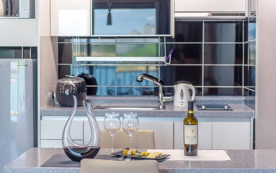 Kitchen or kitchenette in Onda D'oro Hostel