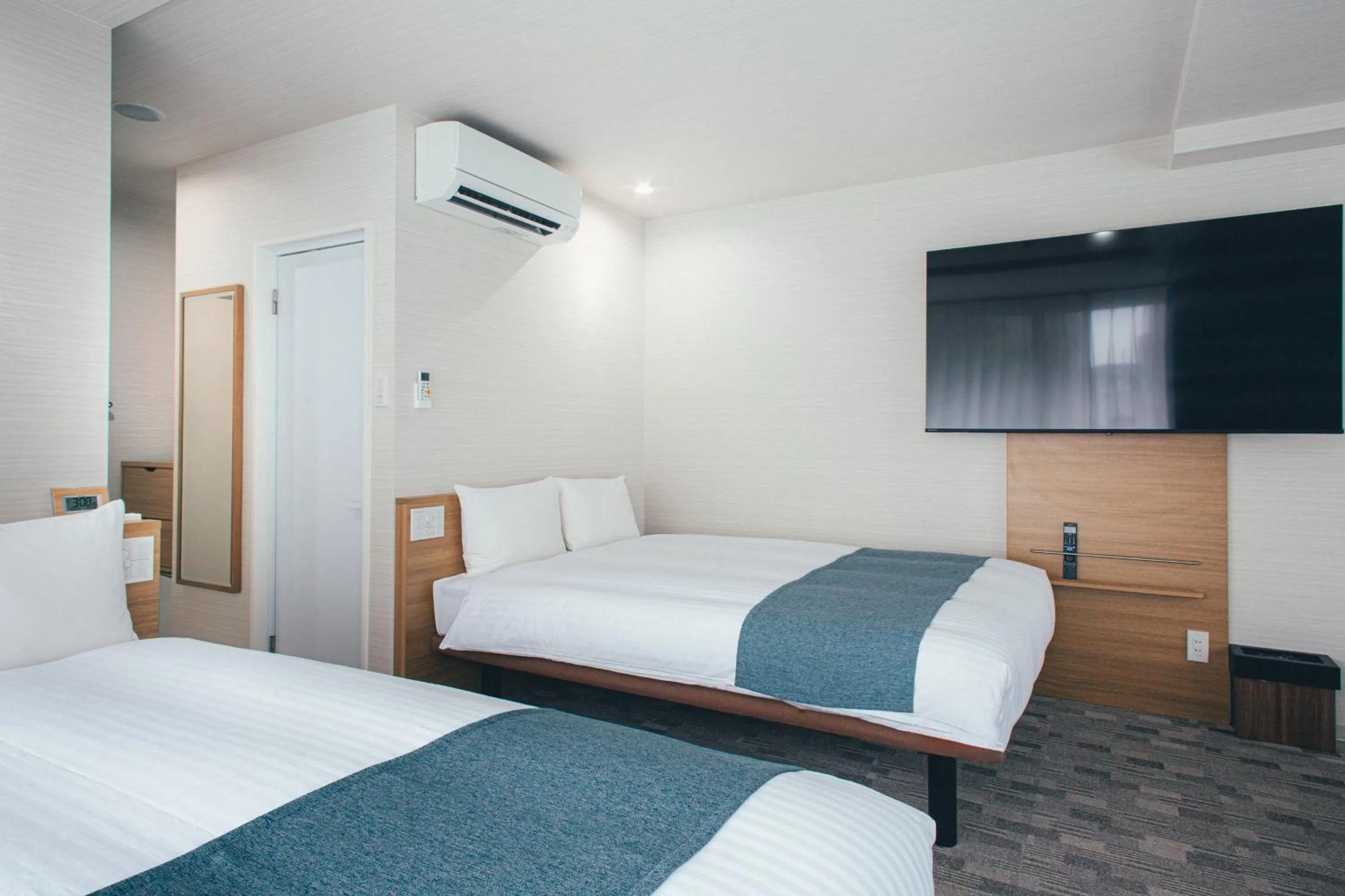 Bed in Kuretake Inn Okayama