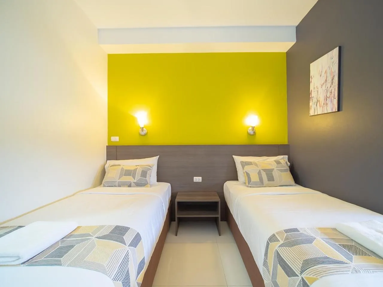 Bed in Fortune D Hotel Maesot
