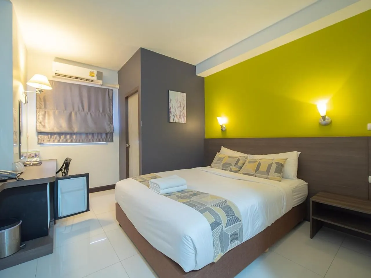 Bed in Fortune D Hotel Maesot