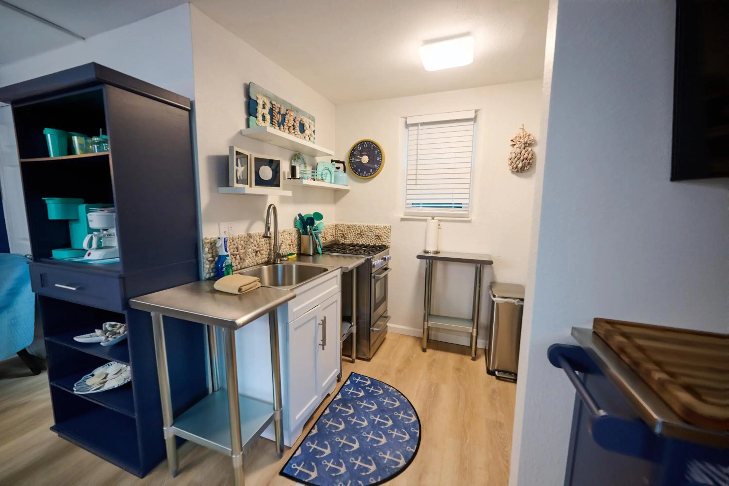 Kitchen or kitchenette in Camelot Beach Suites