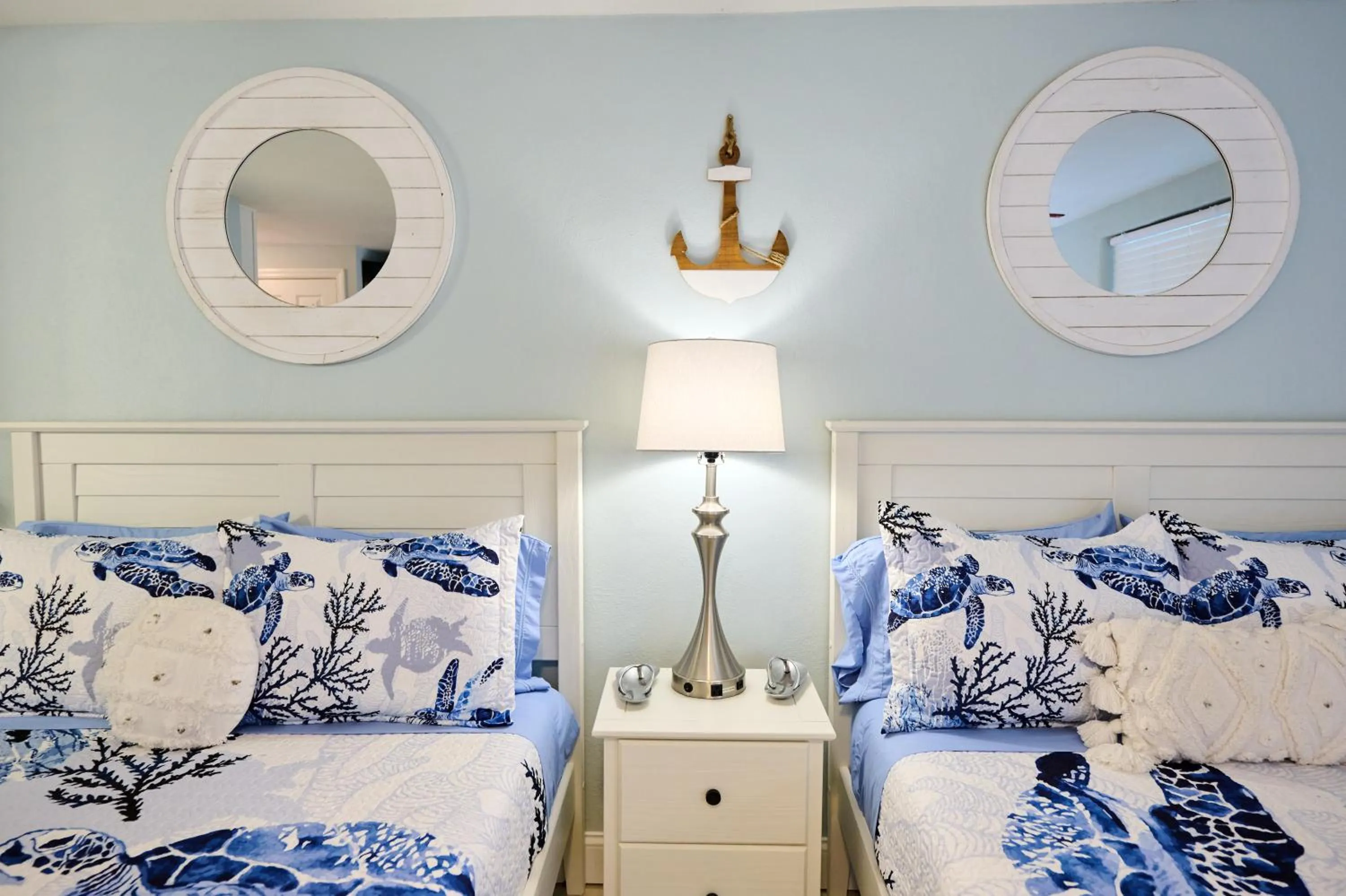 Bed in Camelot Beach Suites