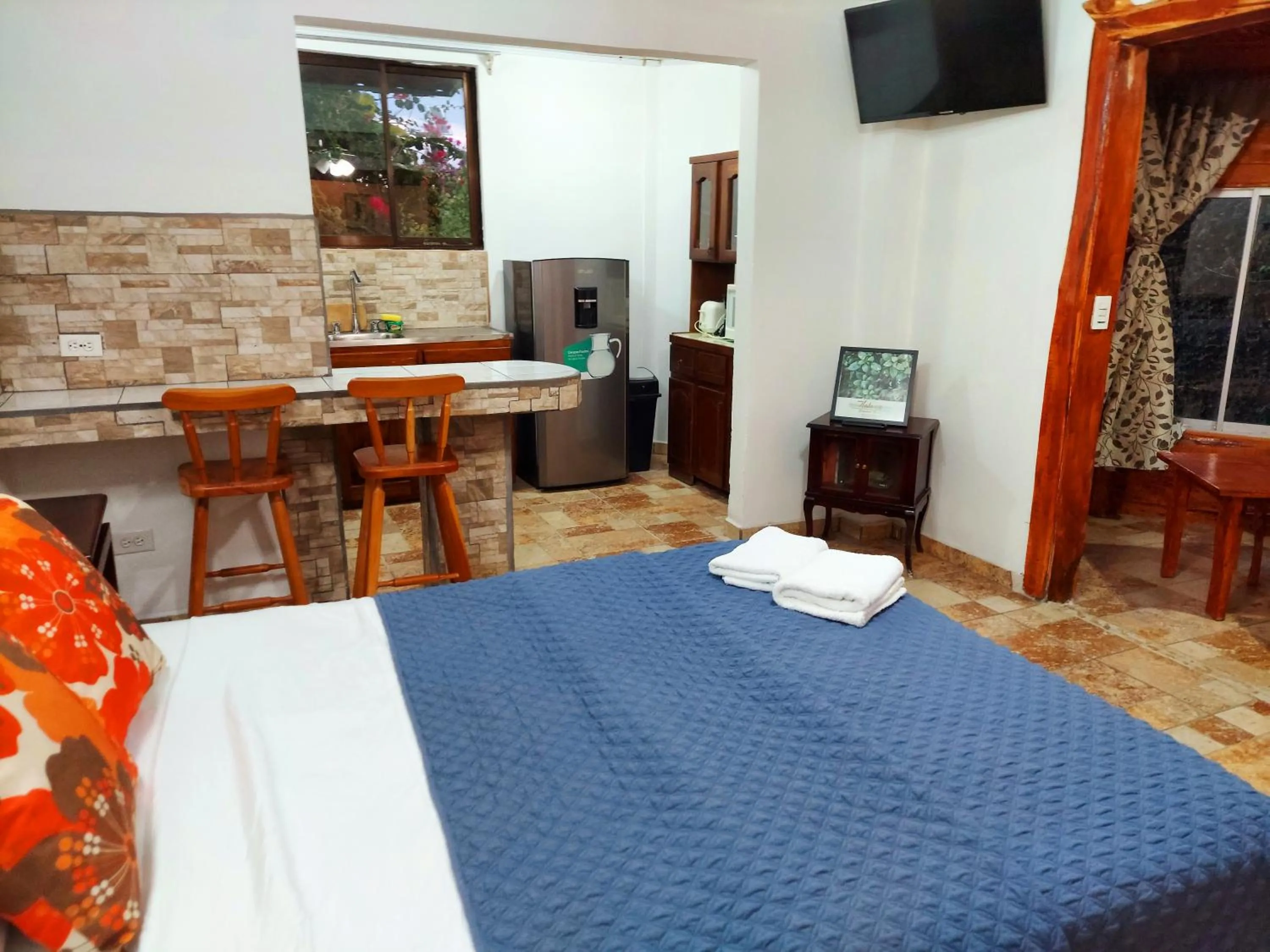 Kitchen or kitchenette, Bed in Loma Tranquila