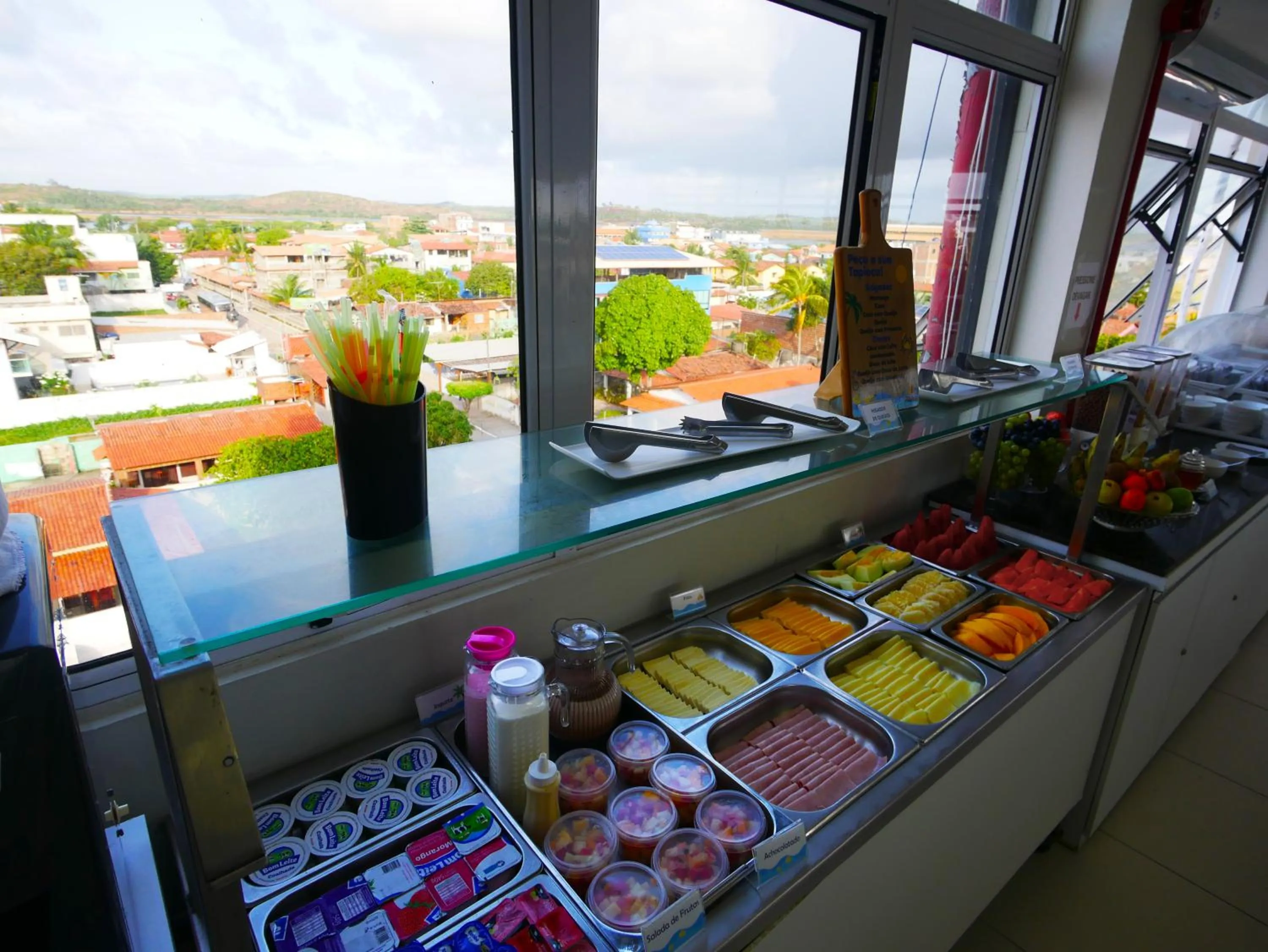 Buffet breakfast in Pousada Marie Claire Flats