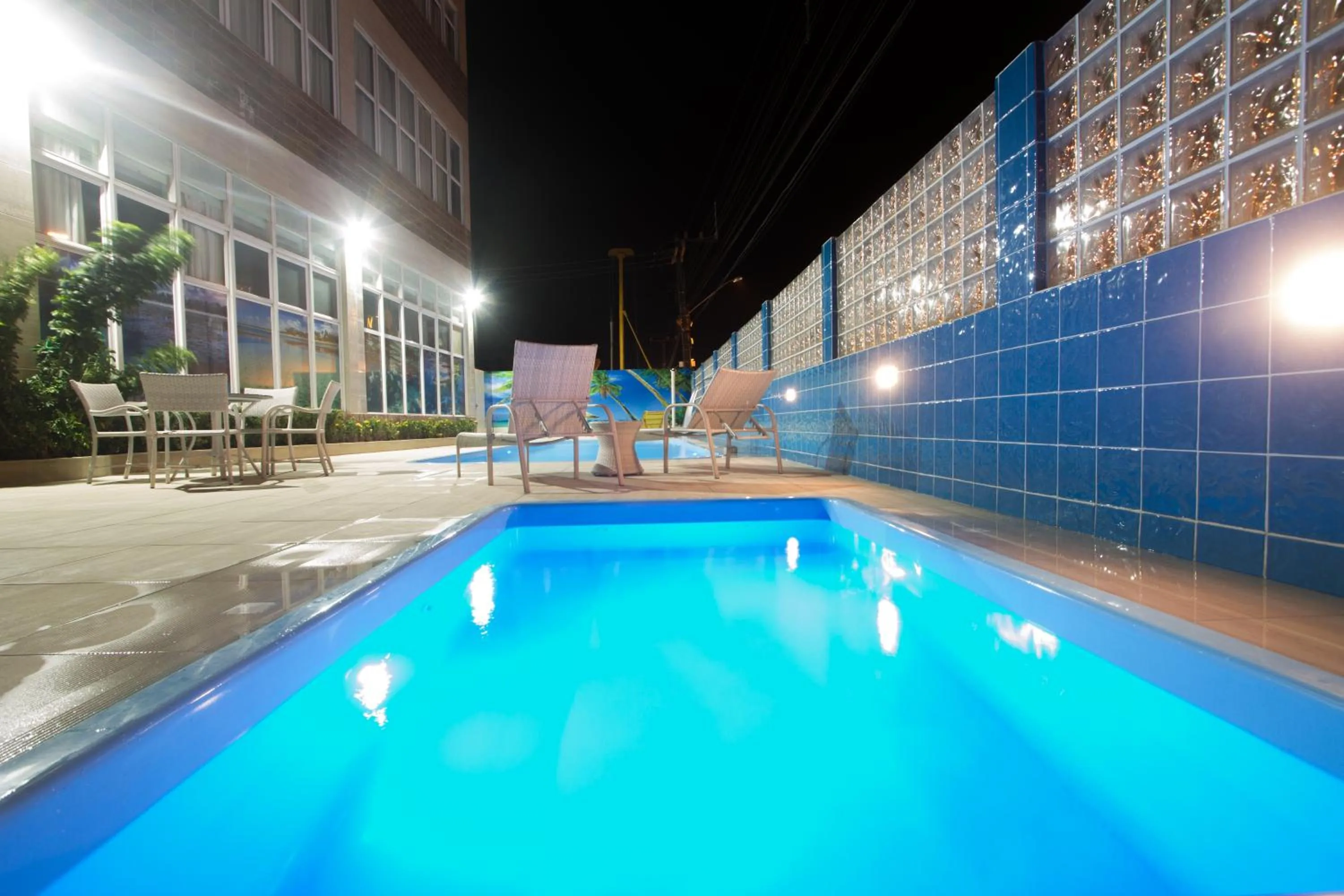 Swimming pool in Pousada Marie Claire Flats