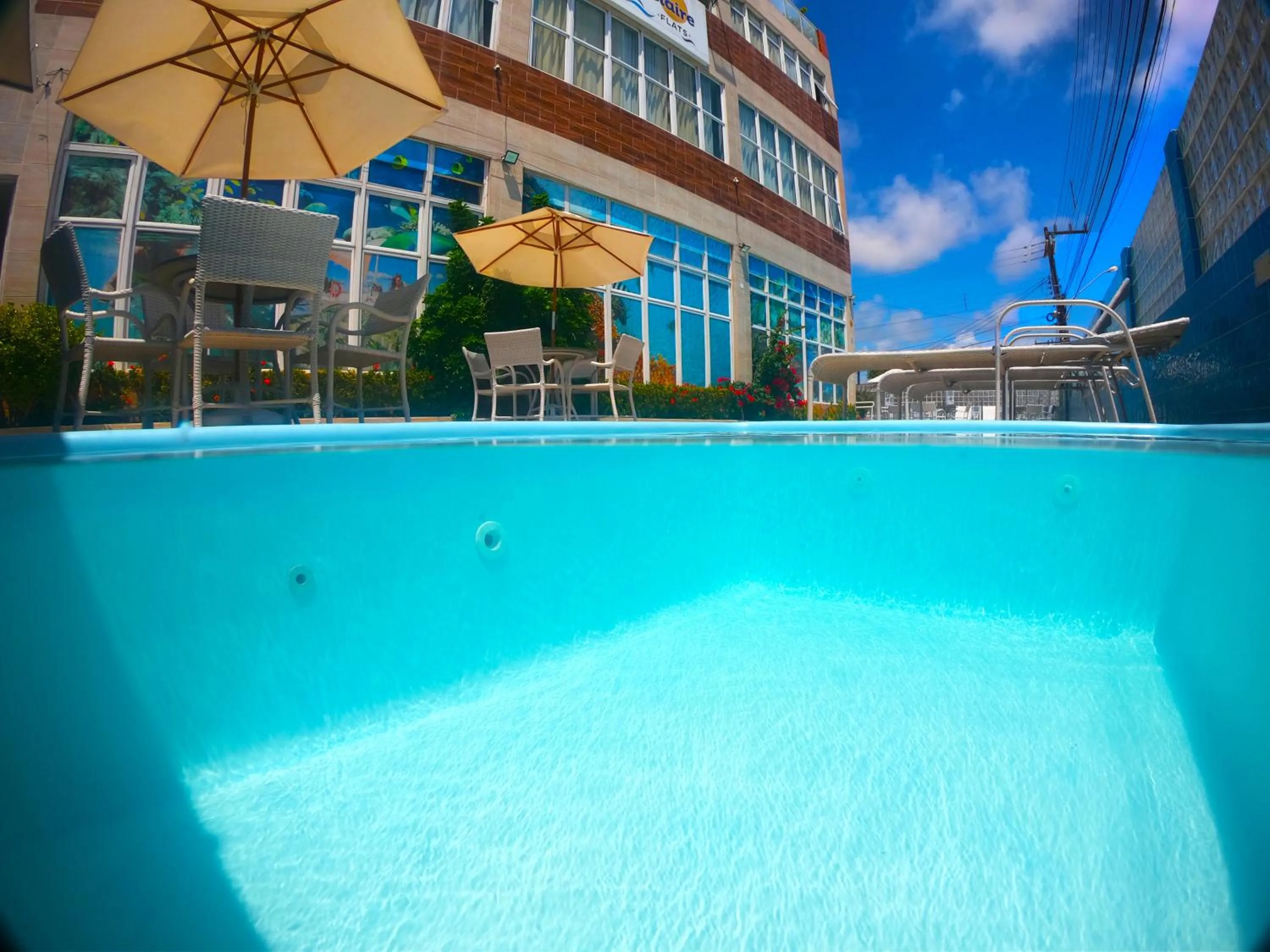 Pool view in Pousada Marie Claire Flats