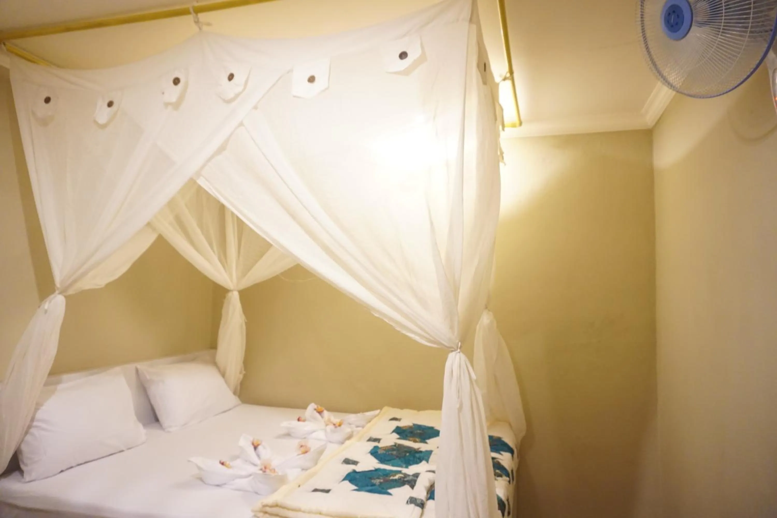 Bed in Damuh Guest House