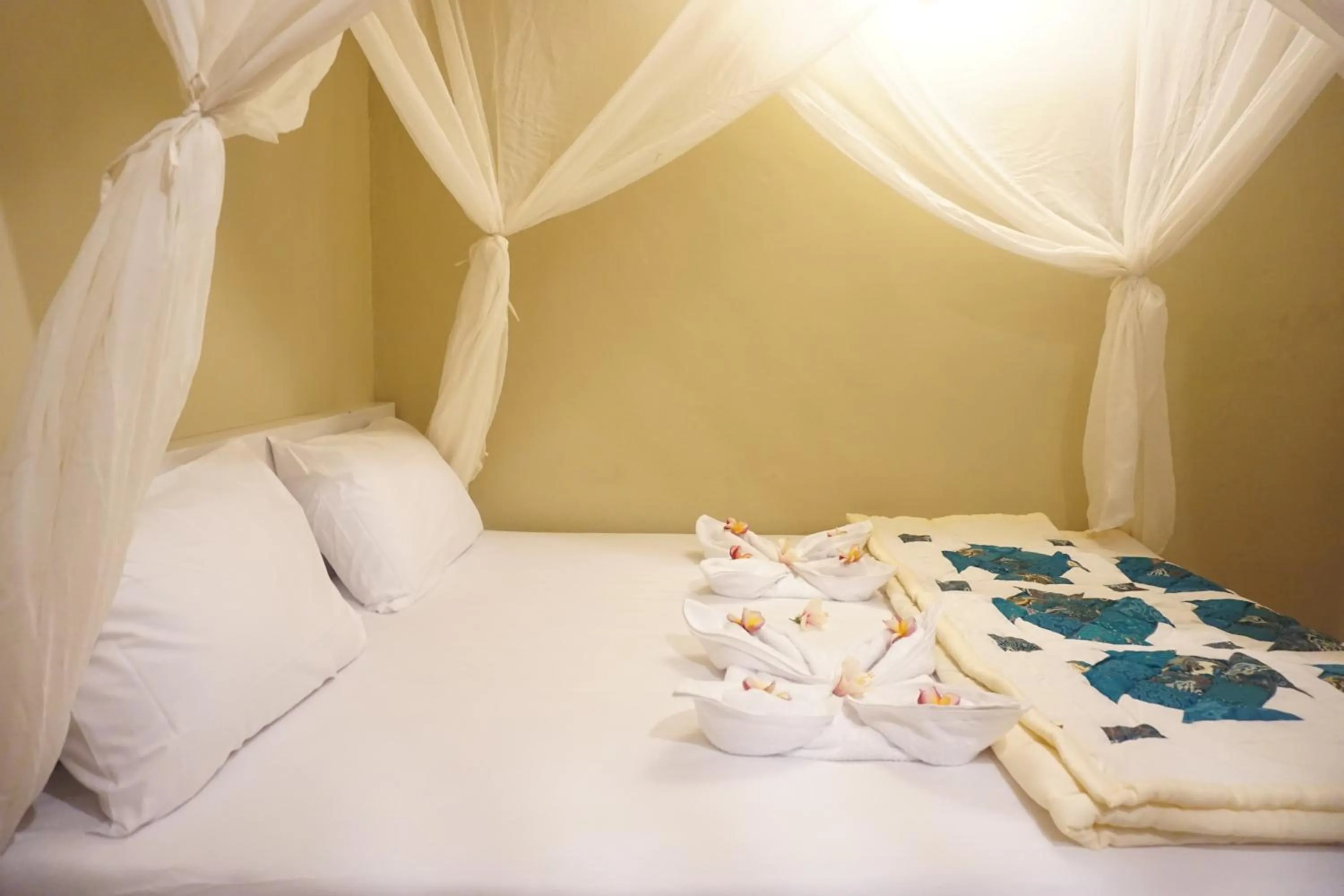 Bed in Damuh Guest House