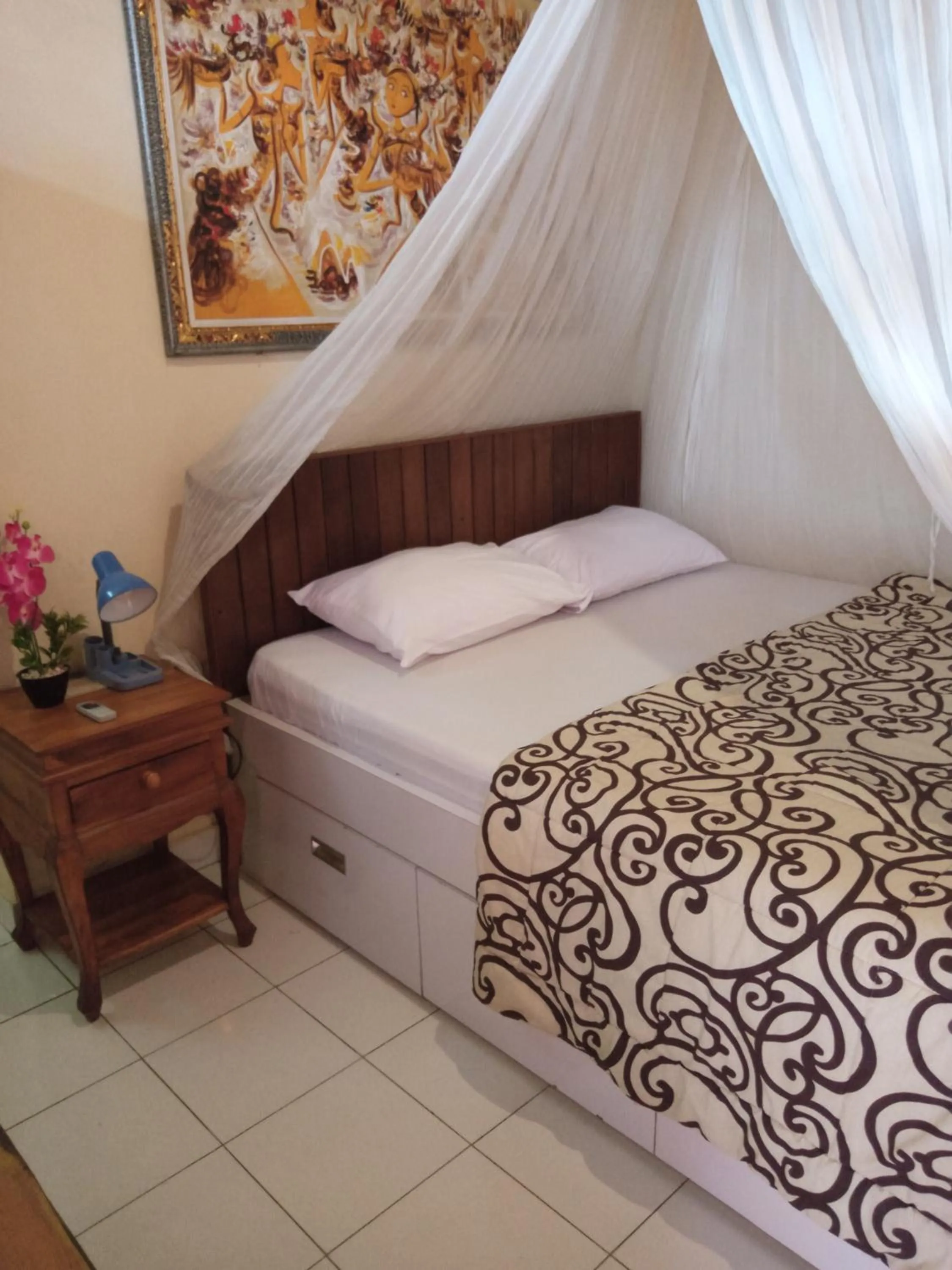 Bed in Damuh Guest House