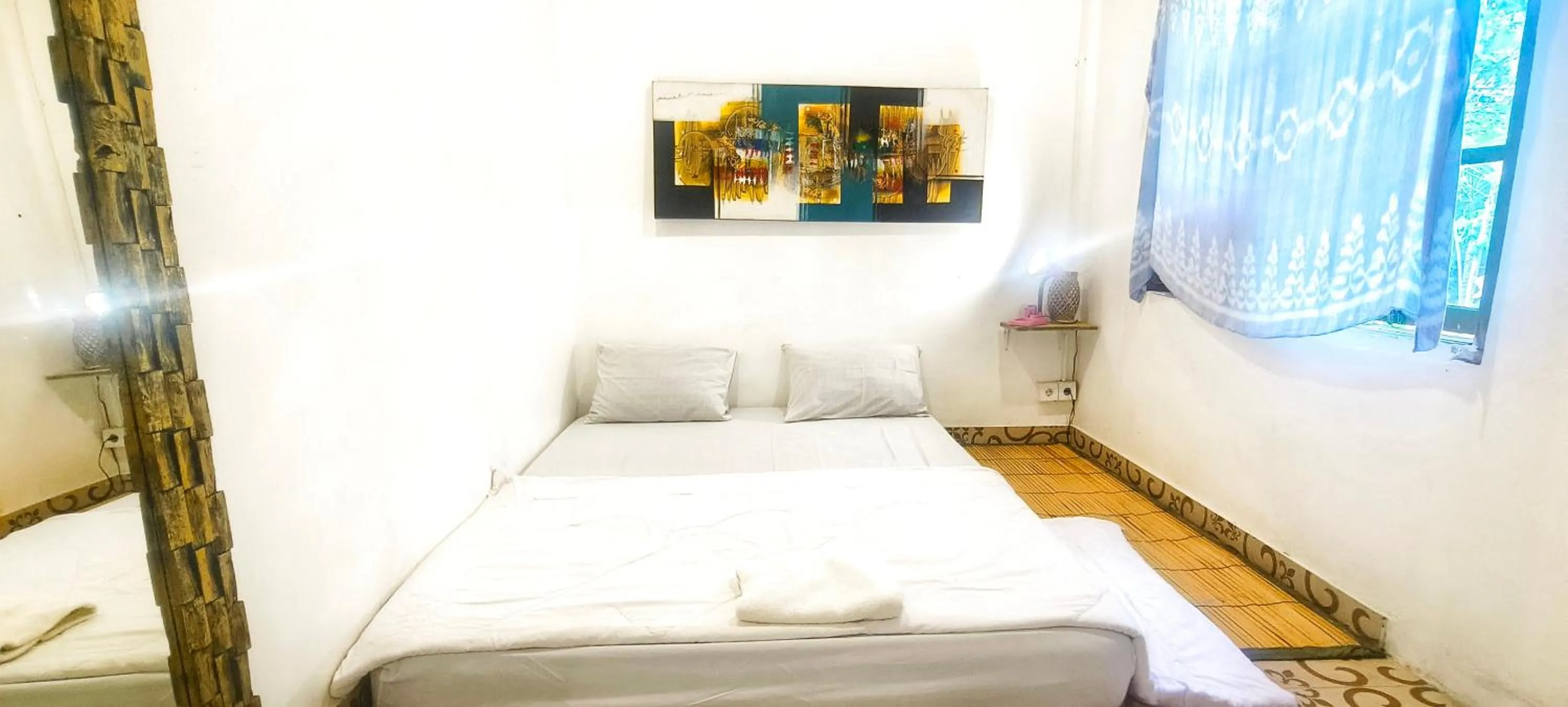 Bed in Damuh Guest House