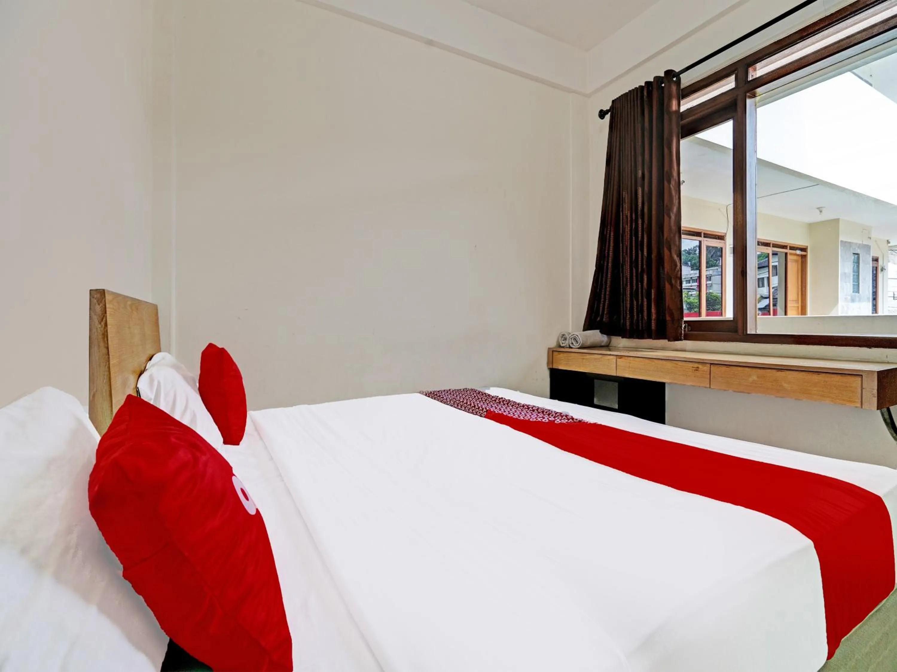 Bedroom in OYO 1699 Verona Residence