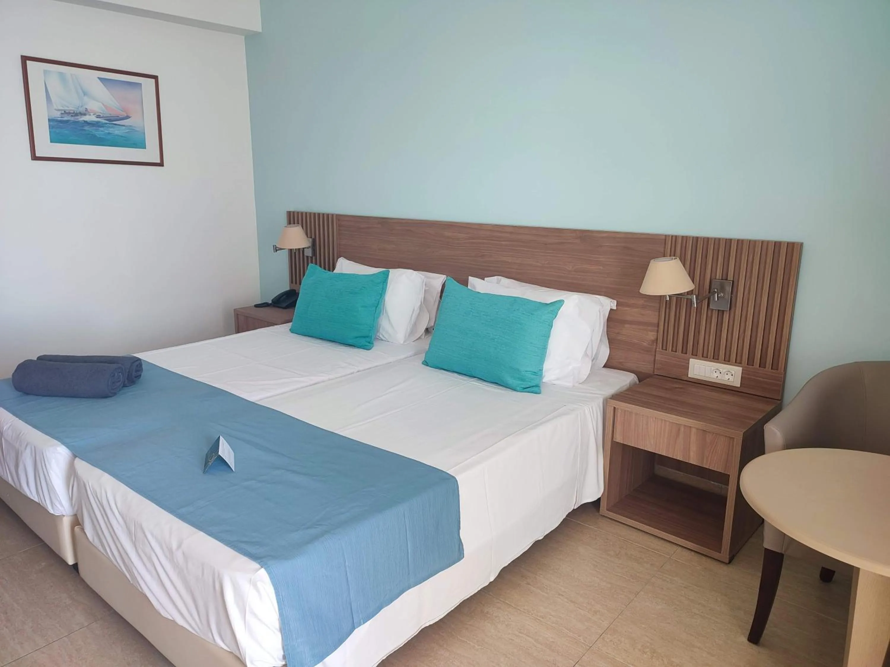 Photo of the whole room, Bed in Asterias Beach Resort