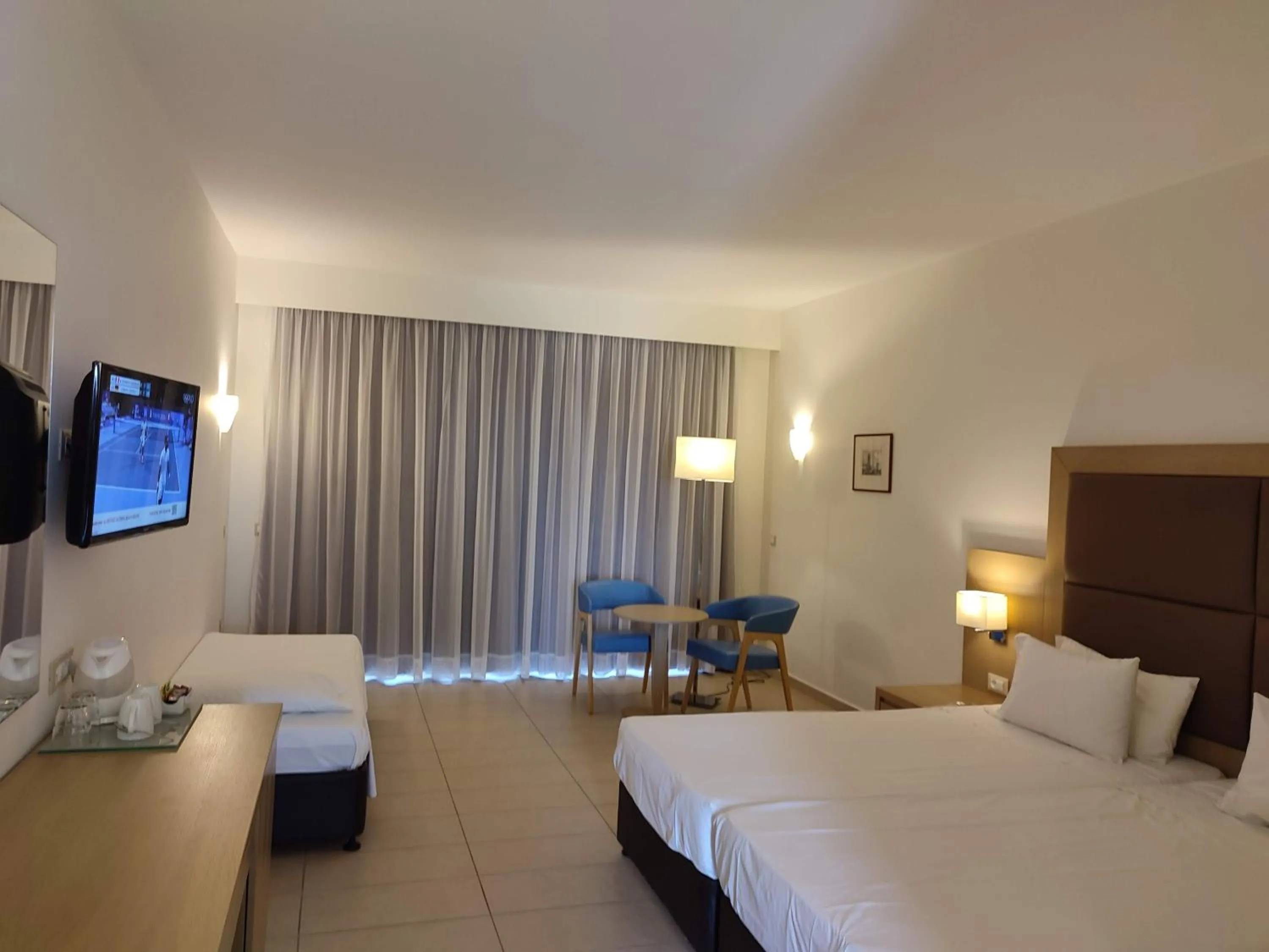 Photo of the whole room, Bed in Asterias Beach Resort