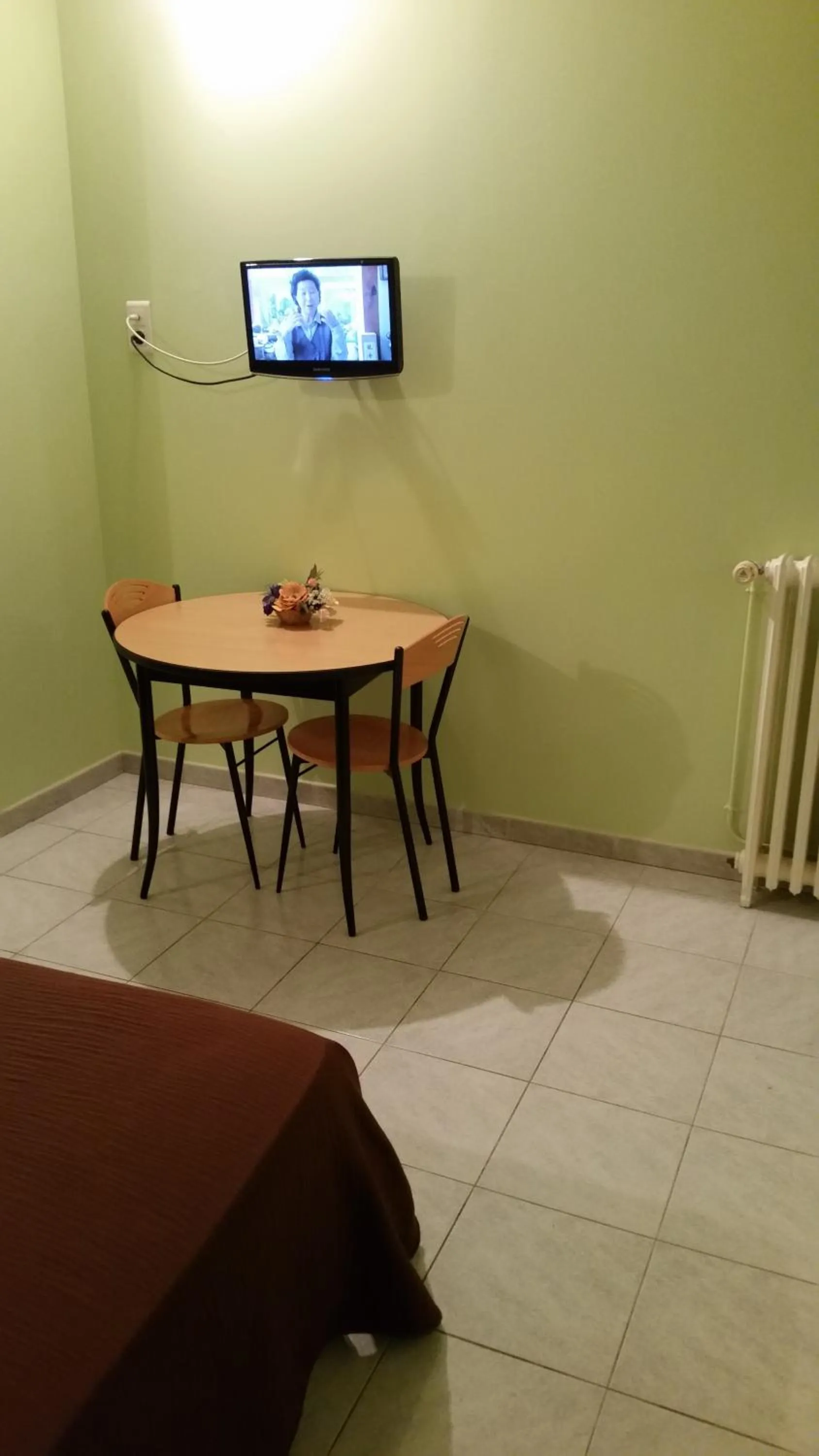 TV and multimedia, TV/Entertainment Center in Hostellerie des Colonnes