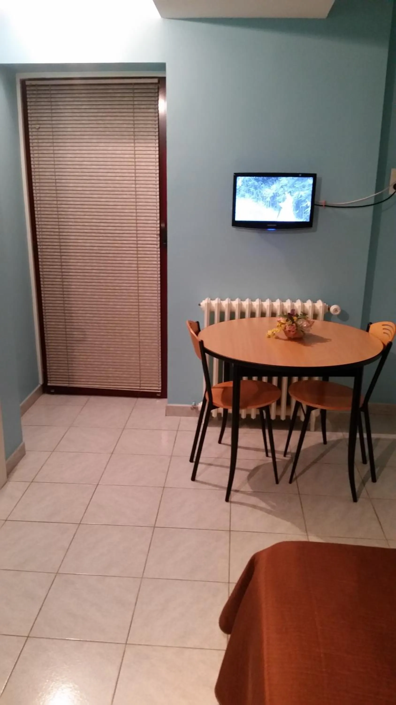 Dining area, TV/Entertainment Center in Hostellerie des Colonnes