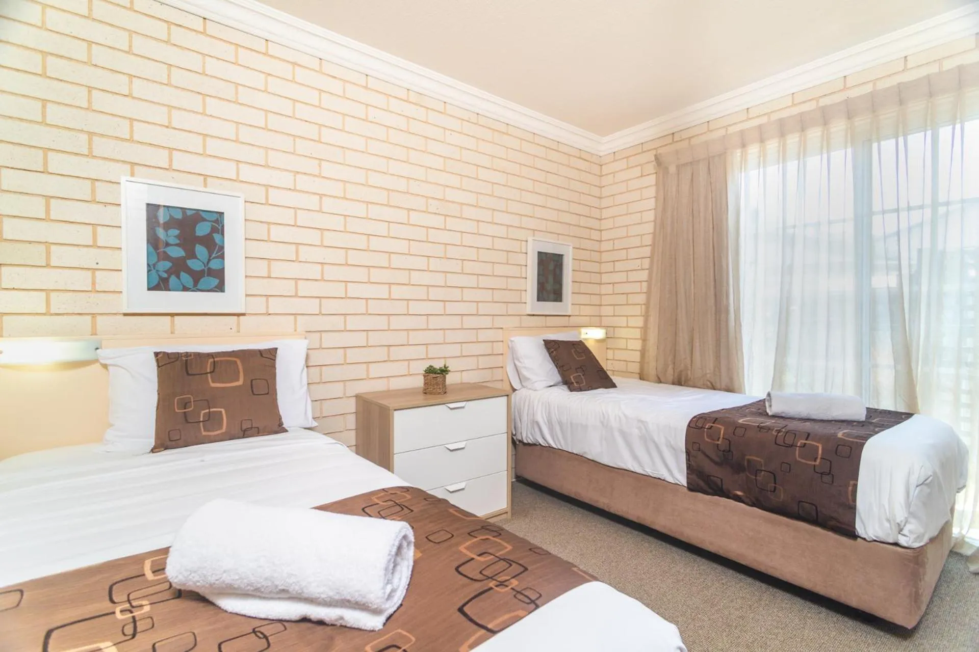 Bed in Santa Fe Motel and Holiday Units