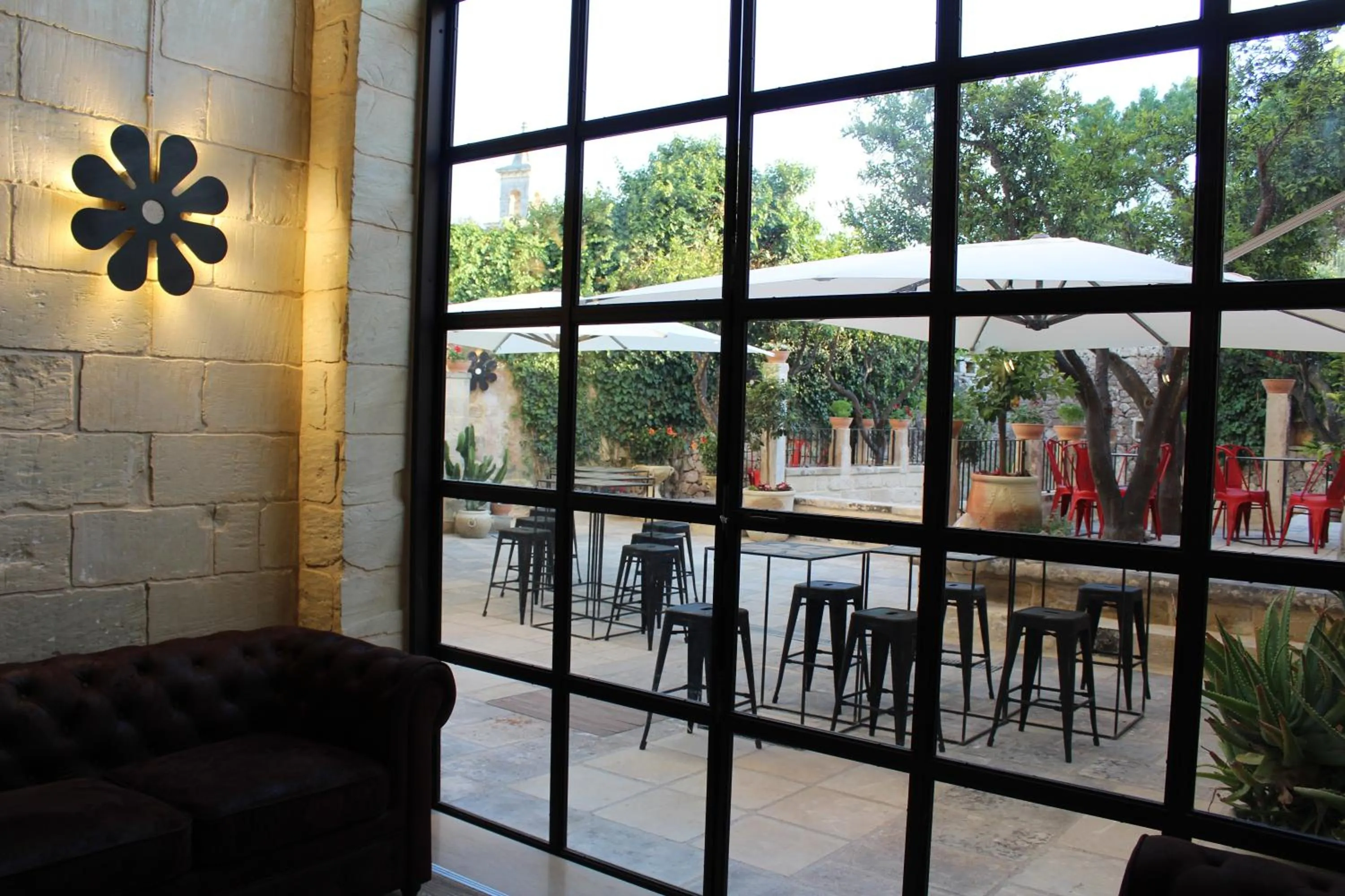 Communal lounge/ TV room in Palazzo Mandurino luxury relais