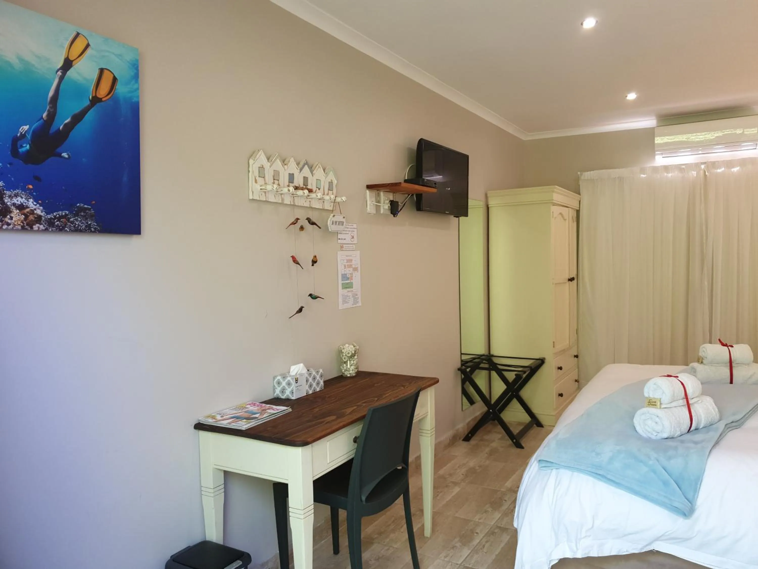 TV and multimedia, Bed in Dilisca Guesthouse