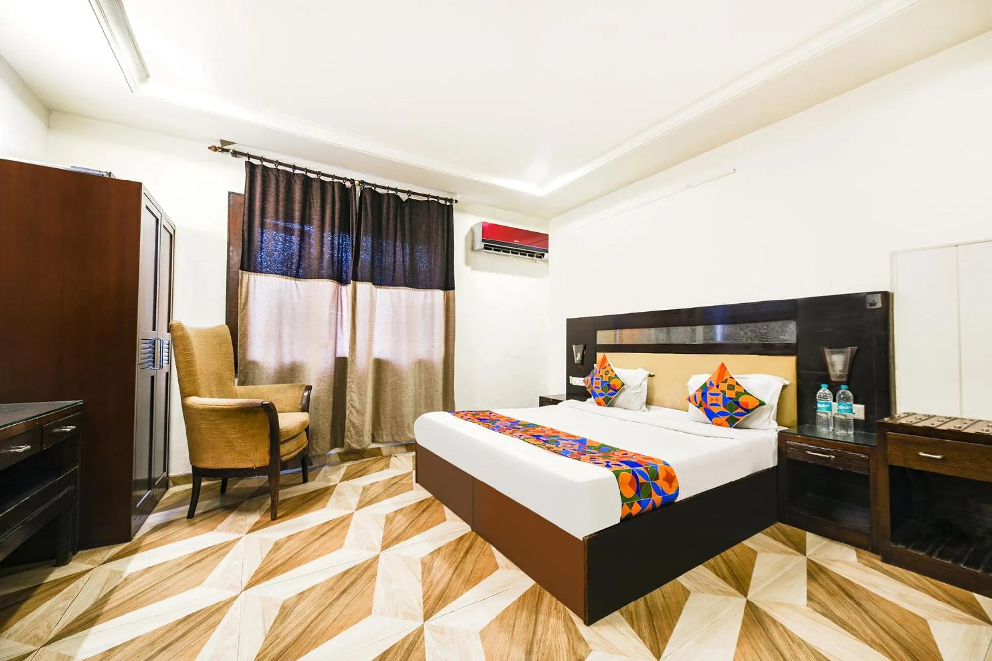 Bed in FabHotel Grand Boutique