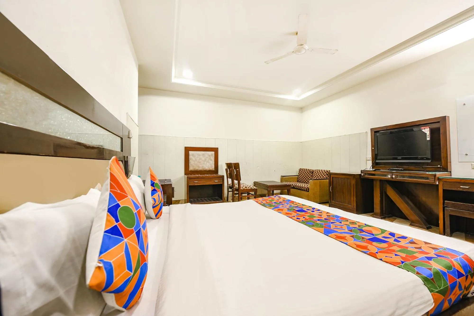 Bed in FabHotel Grand Boutique