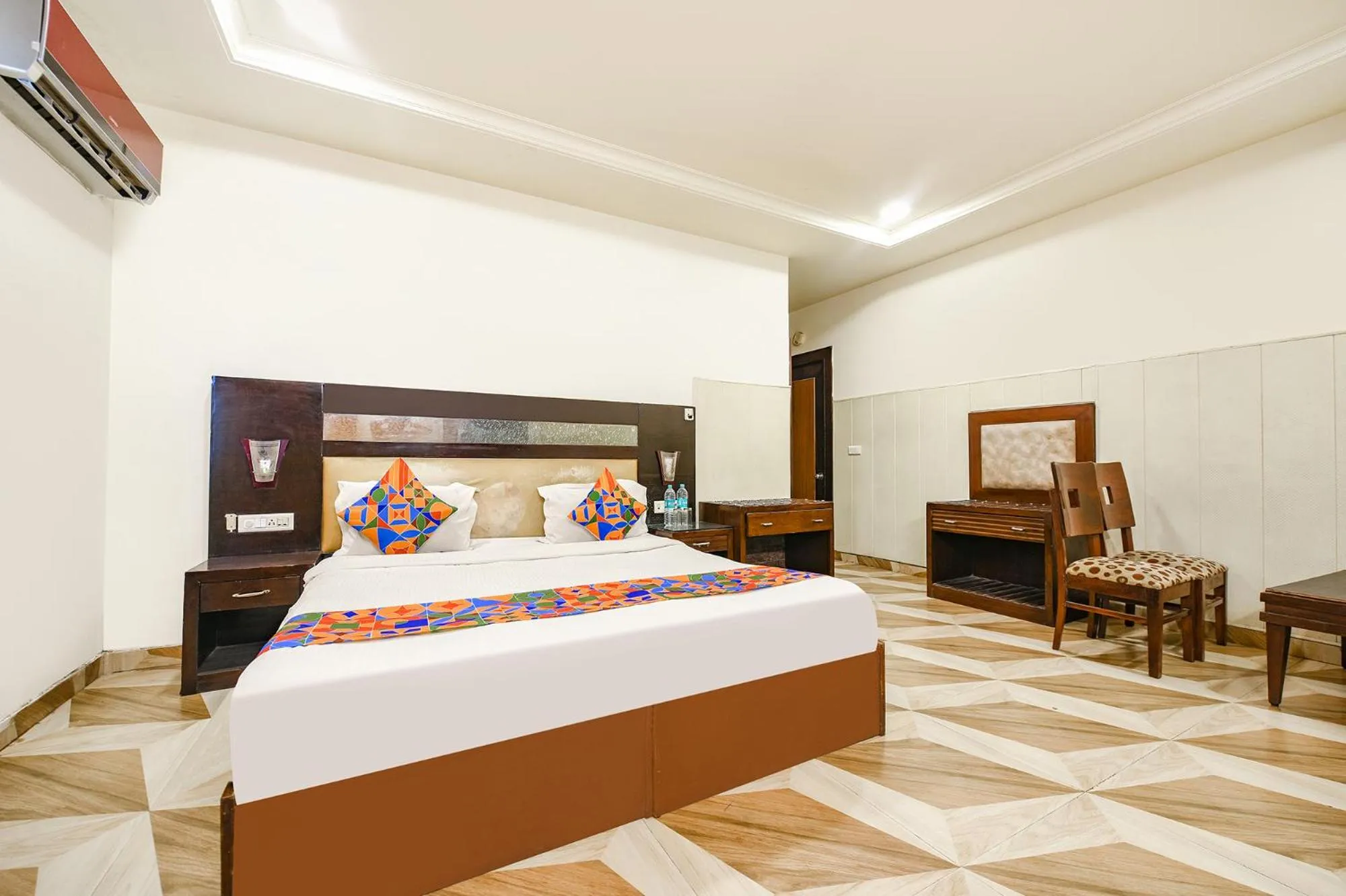 Bed in FabHotel Grand Boutique