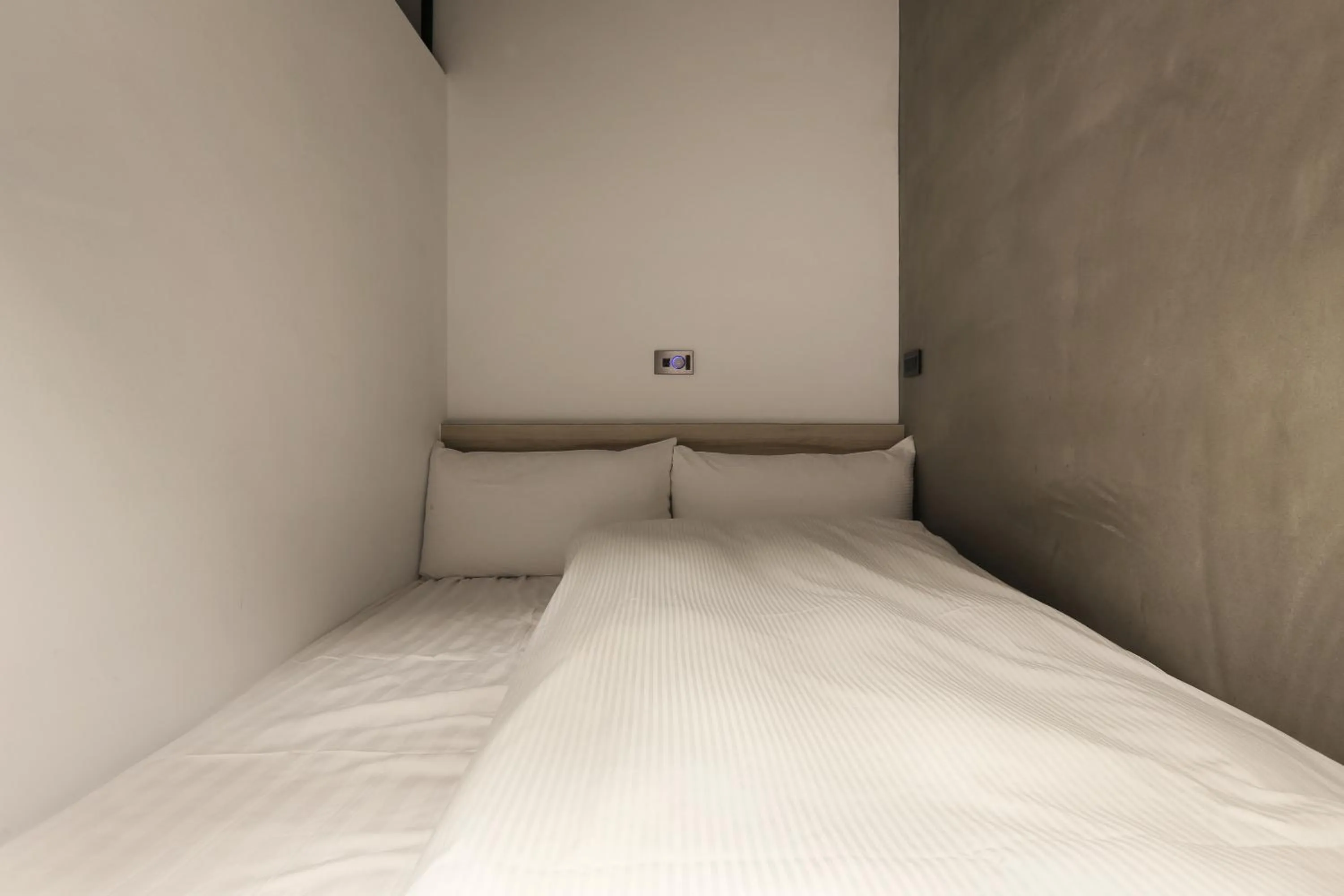 Bed in MINI HOTELS (Feng Jia Branch)