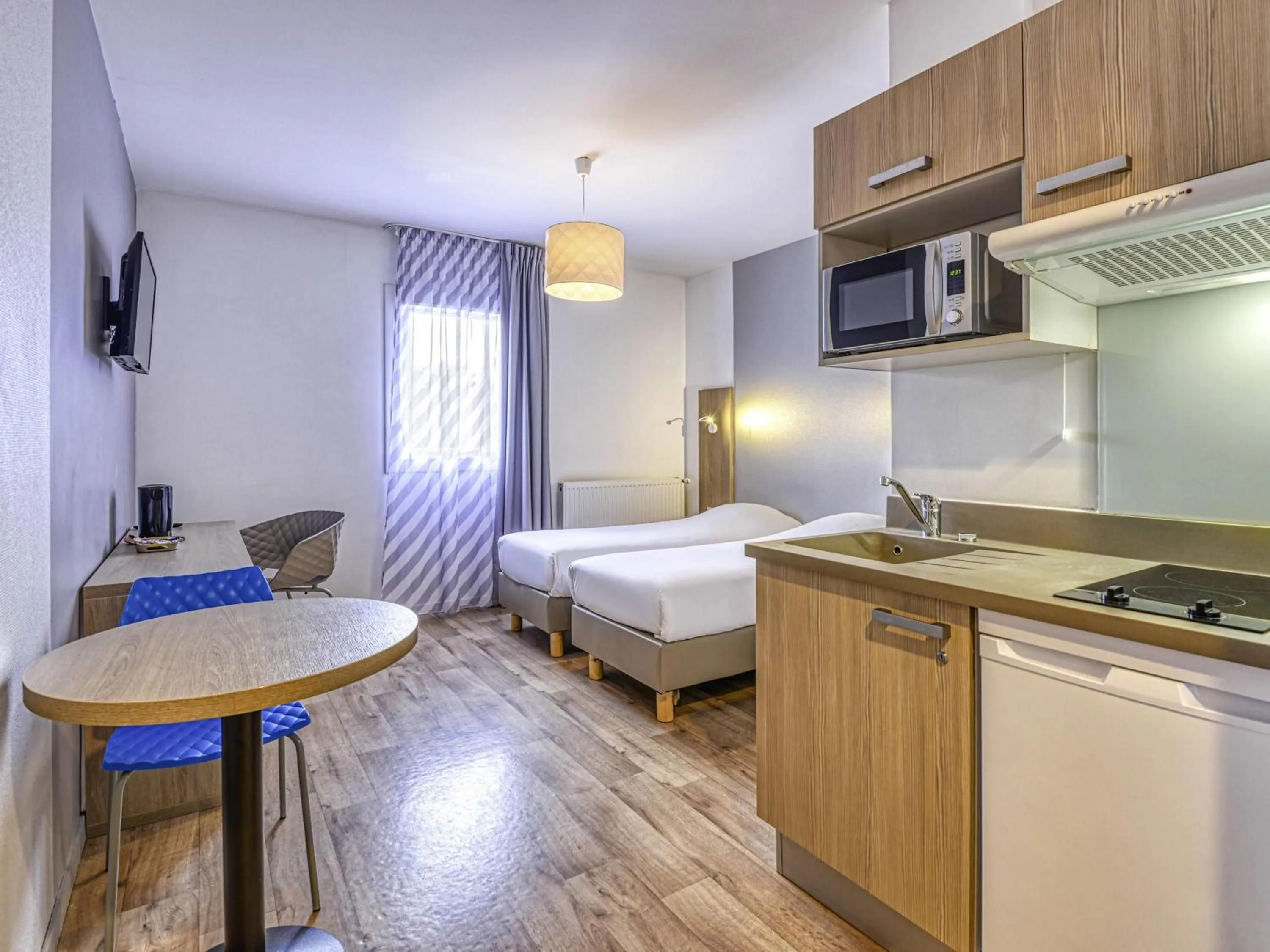 Bedroom, Bed in Aparthotel Adagio Access Saint Nazaire