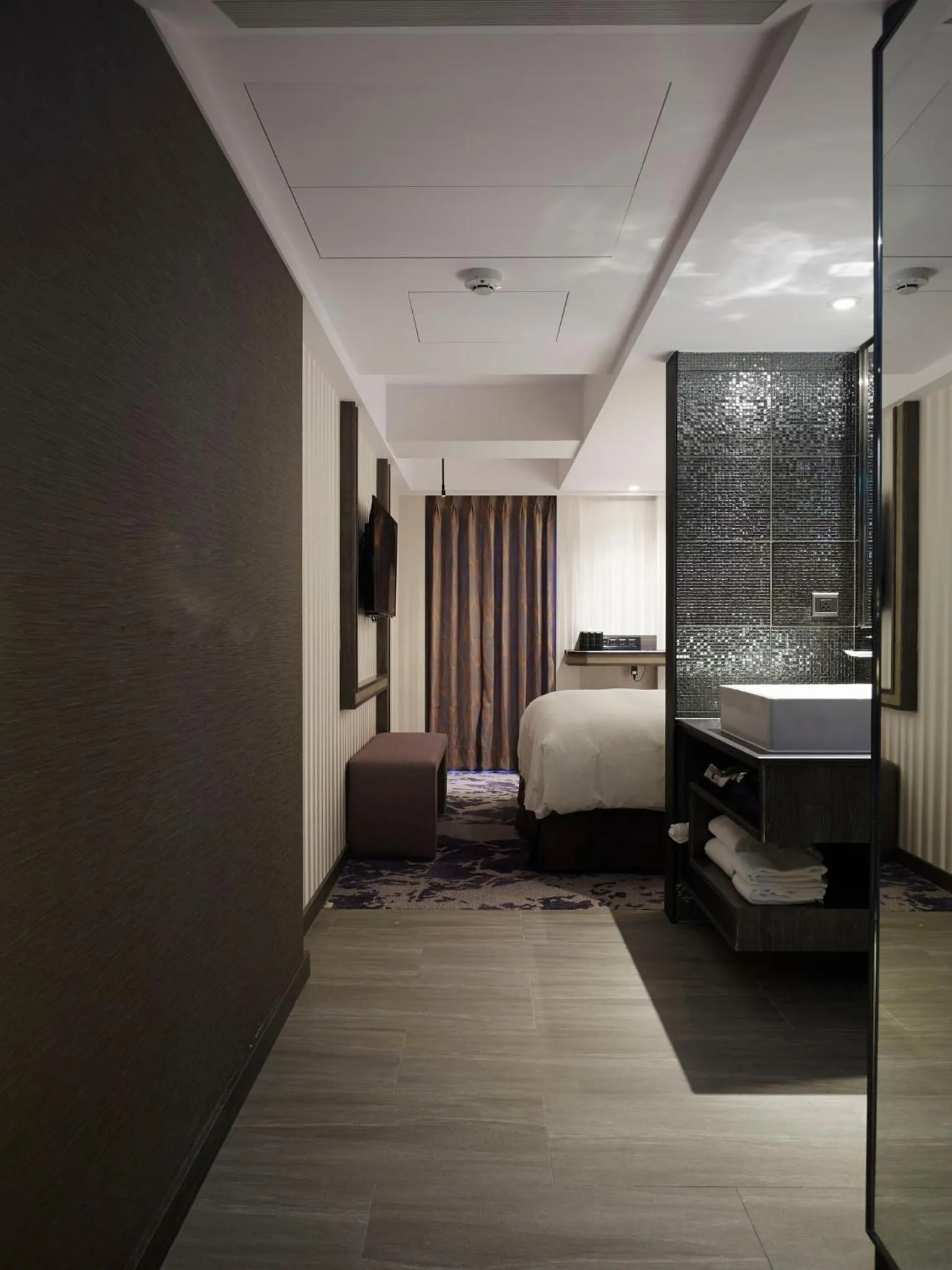 Decorative detail, Bed in At Home Hotel Ximen