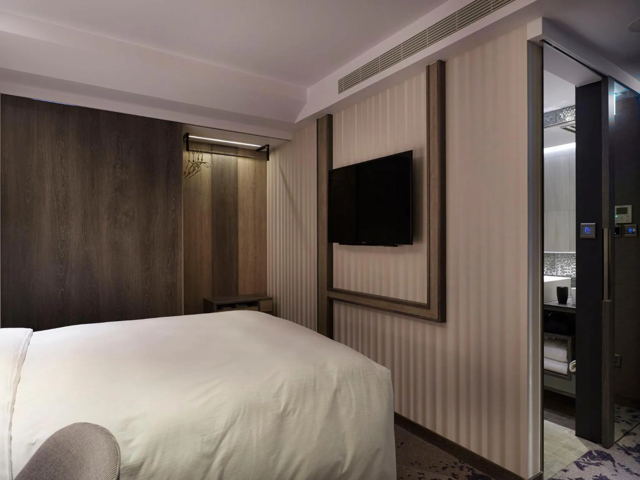 Photo of the whole room, Bed in At Home Hotel Ximen