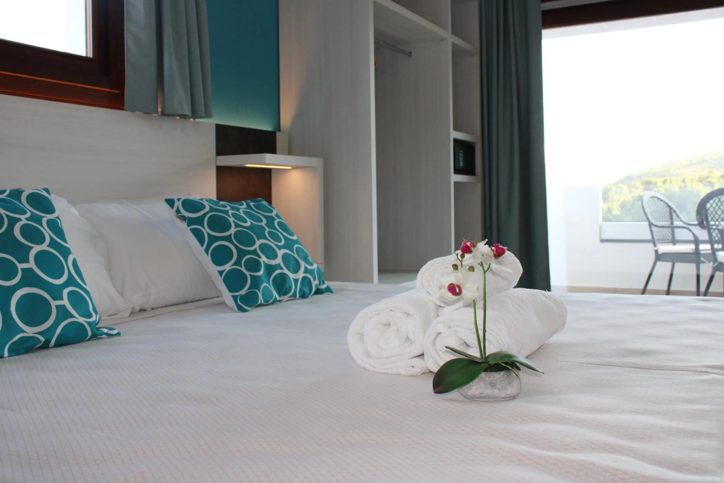 Bed in I Ginepri Hotel