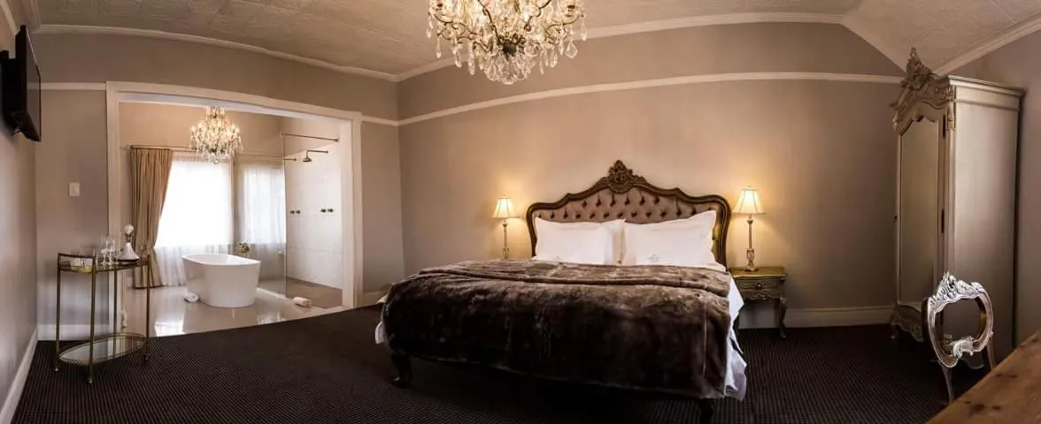 Bed in The Kingsman boutique Hotel