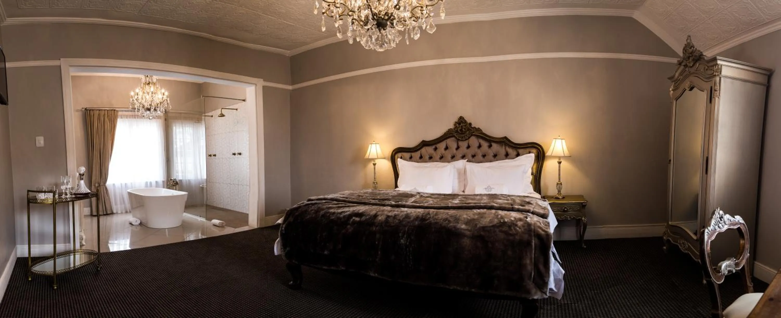 Bed in The Kingsman boutique Hotel