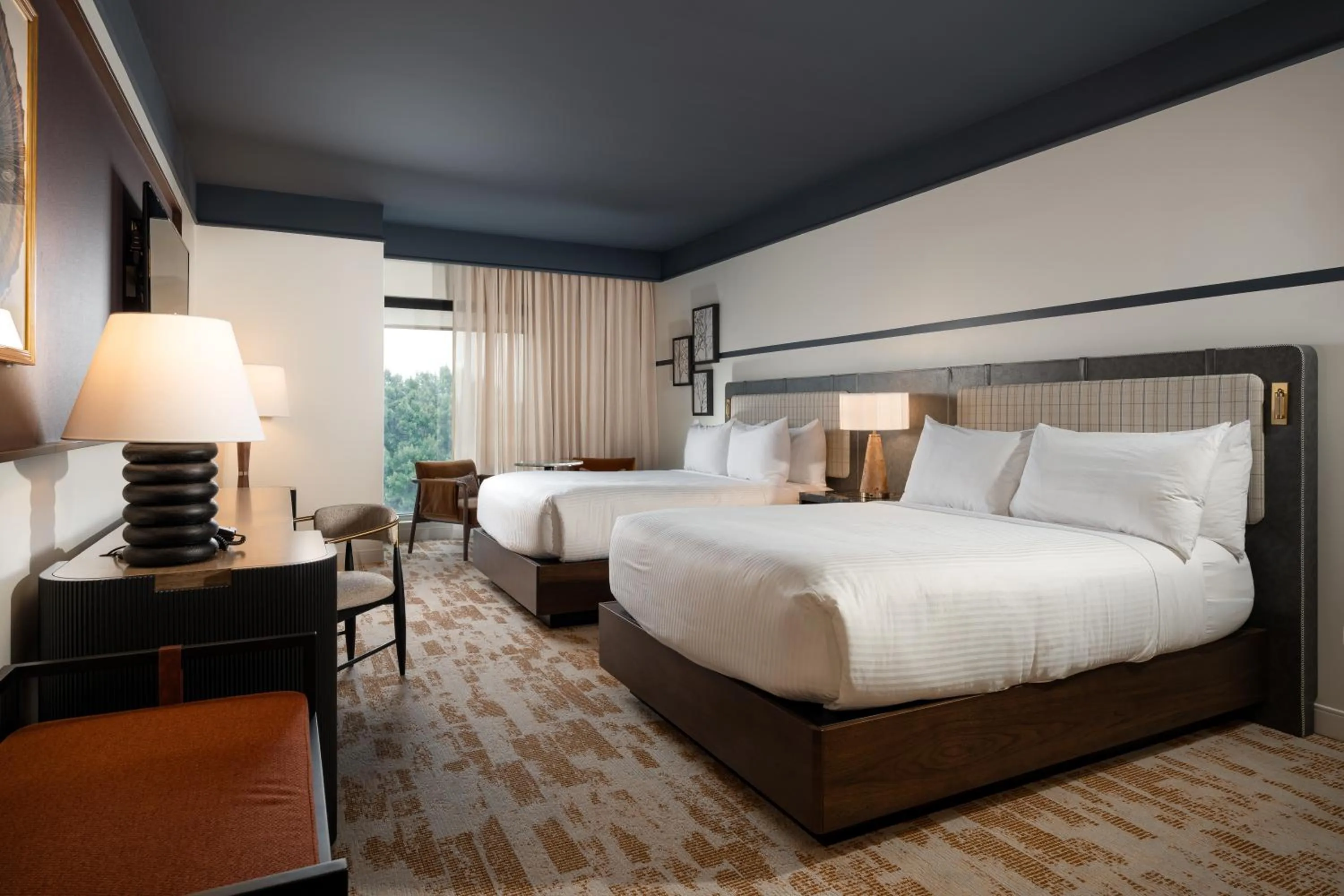 Bed in The Elmore Hotel, DFW Southlake, a Tribute Portfolio Hotel