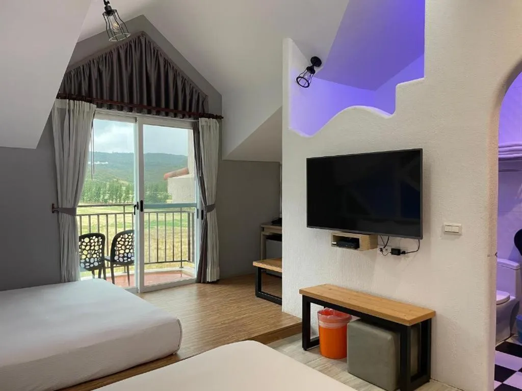 Photo of the whole room, Bed in Island on the Sea